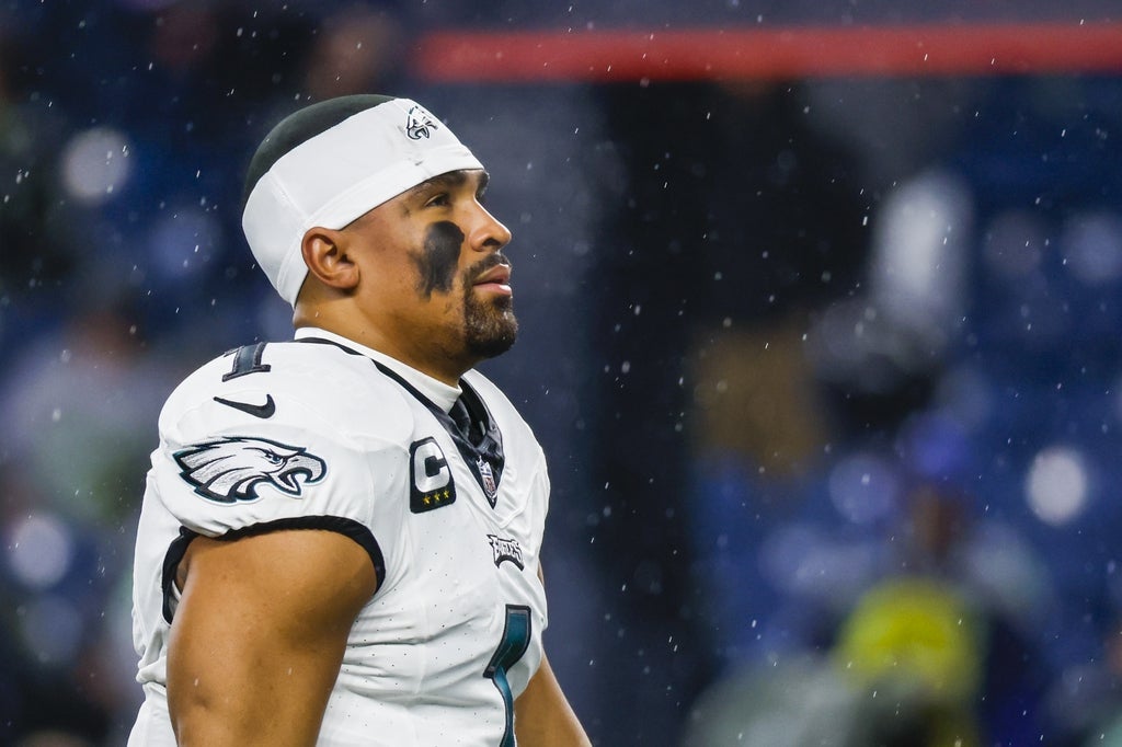 Philadelphia Eagles quarterback Jalen Hurts (1) participates in pregame warmups against the Seattle Seahawks at Lumen Field.