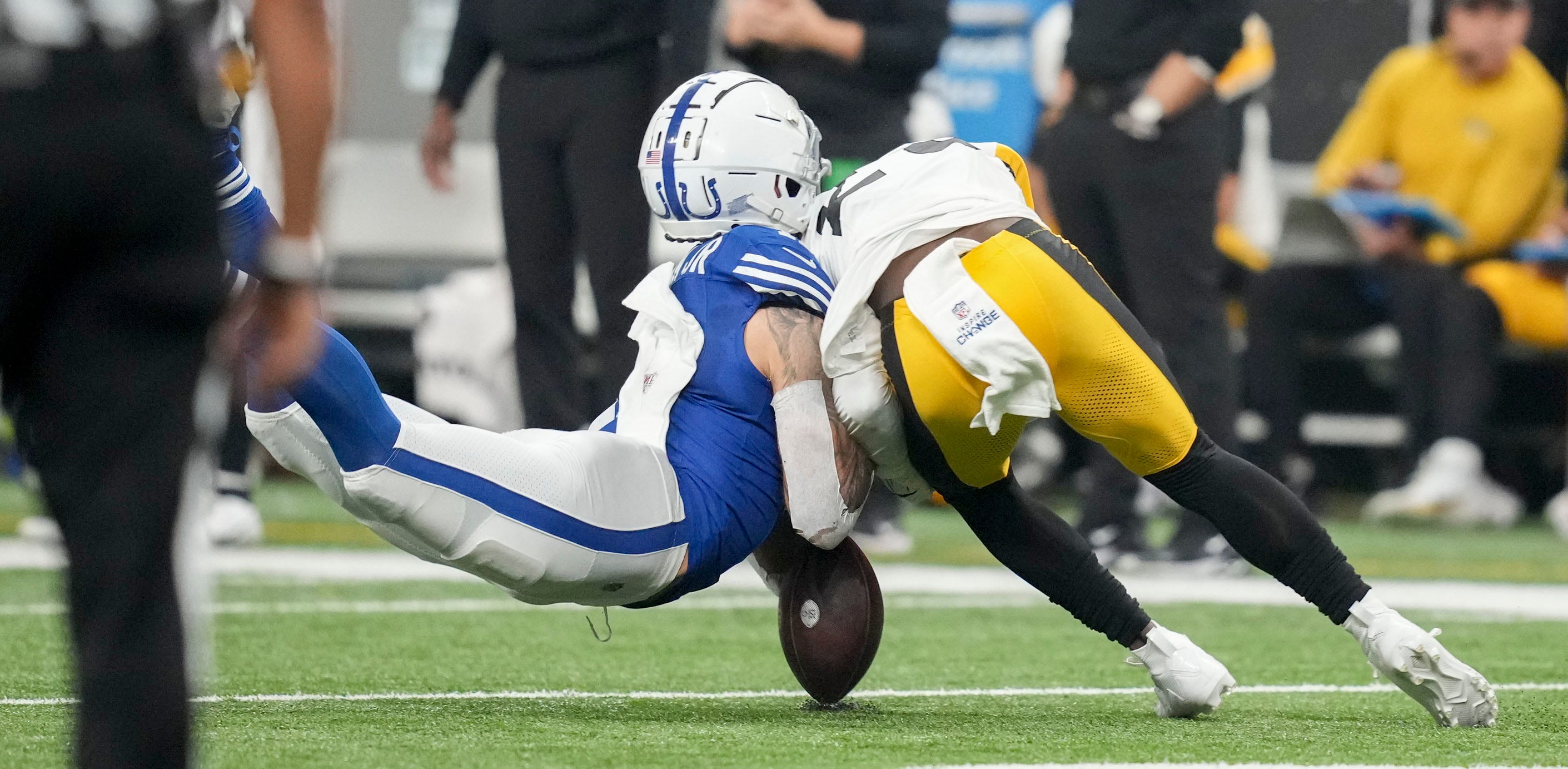 Indianapolis Colts wide receiver Michael Pittman Jr. (11) collides with Pittsburgh Steelers safety Damontae Kazee (23) on Saturday, Dec. 16, 2023, during a game against the Pittsburgh Steelers at Lucas Oil Stadium in Indianapolis. Pittman Jr. left the field after the play.