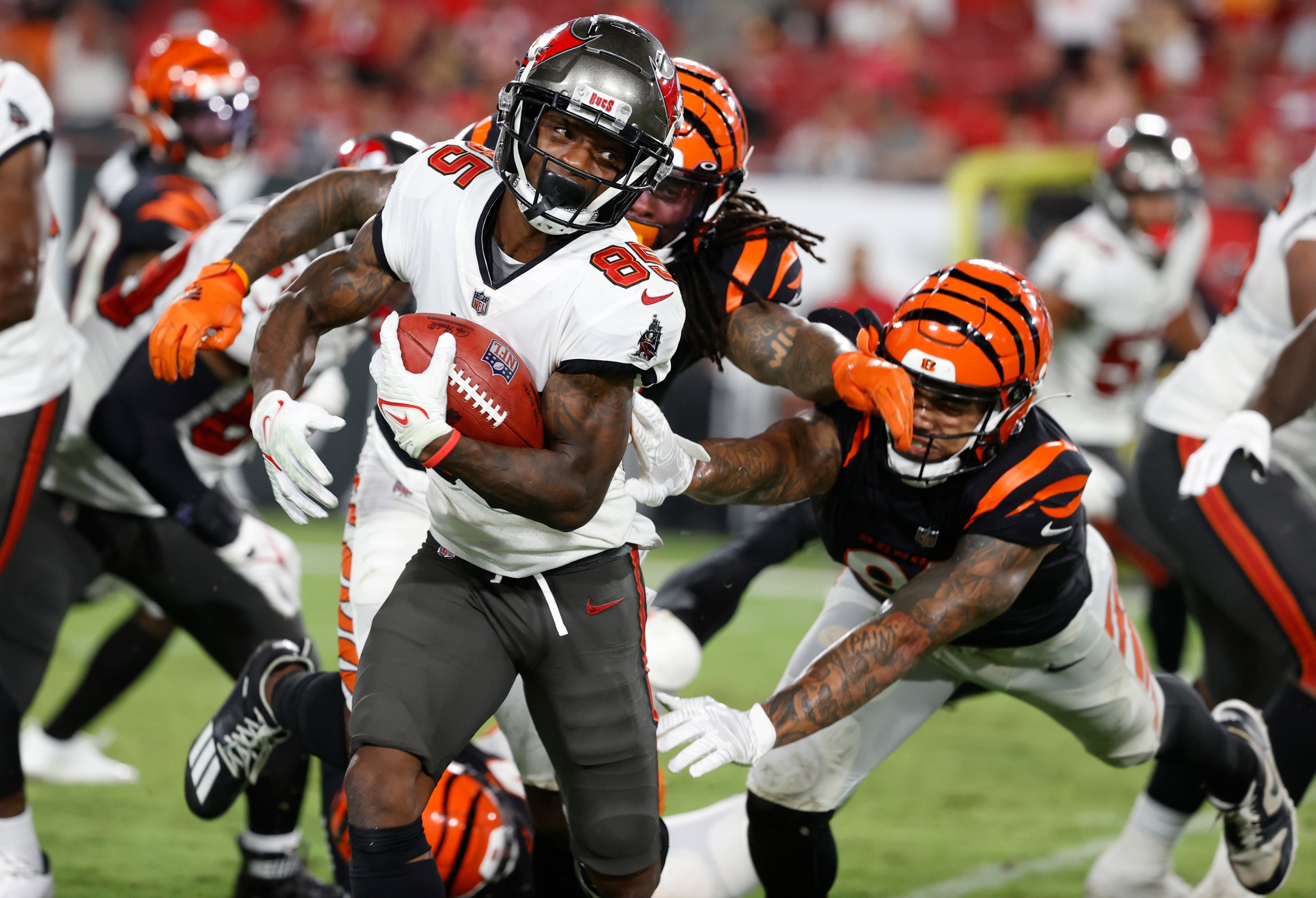 Aug 14, 2021; Tampa, Florida, USA; Tampa Bay Buccaneers wide receiver Jaydon Mickens (85) runs with the ball against the Cincinnati Bengals during the second half at Raymond James Stadium.