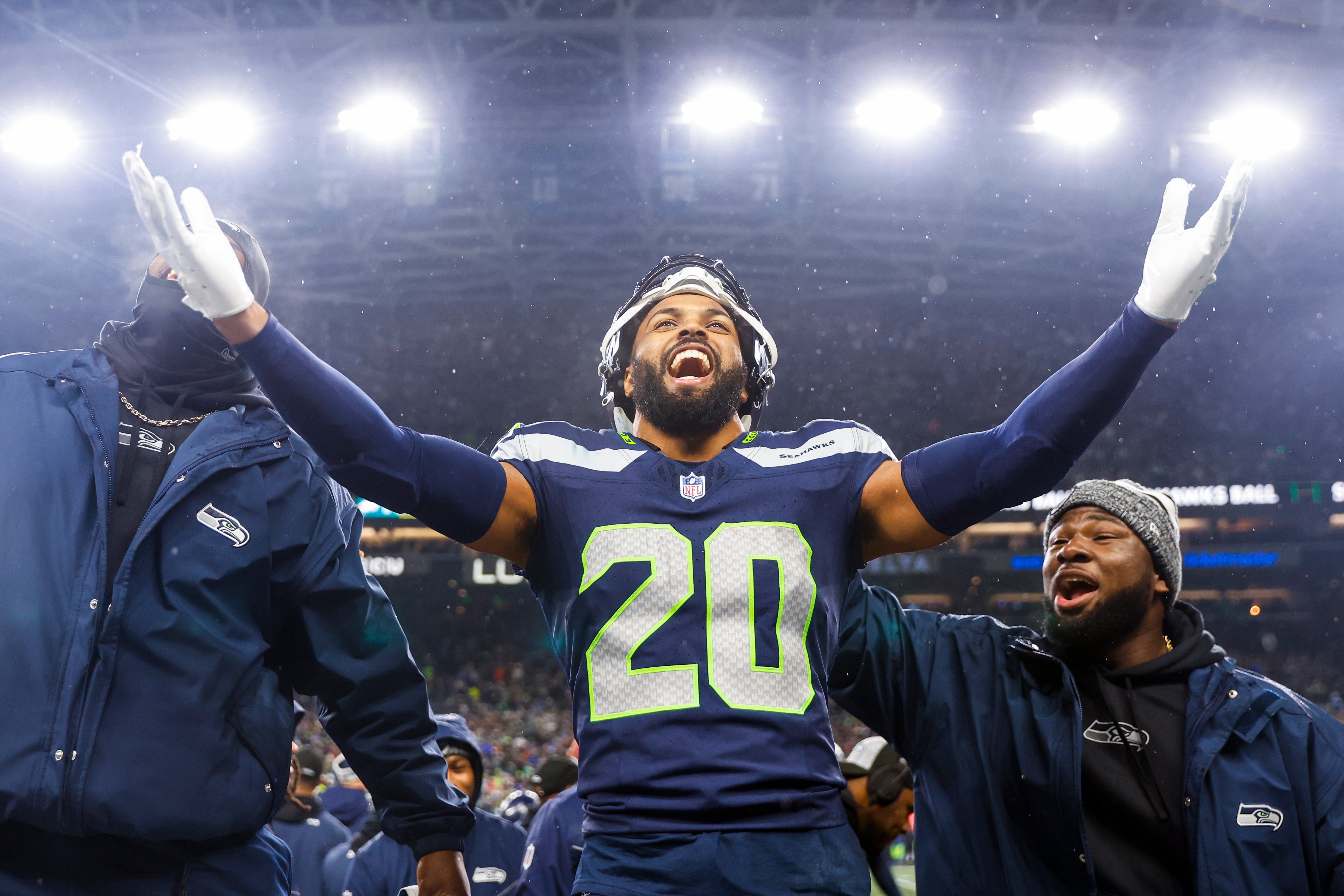 Dec 18, 2023; Seattle, Washington, USA; Seattle Seahawks safety Julian Love (20) celebrates on the bench after his second interception of the fourth quarter against the Philadelphia Eagles at Lumen Field.