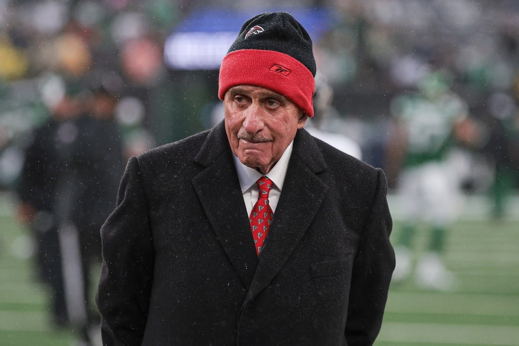 Atlanta Falcons owner Arthur Blank on the field before the game against the New York Jets at MetLife Stadium.