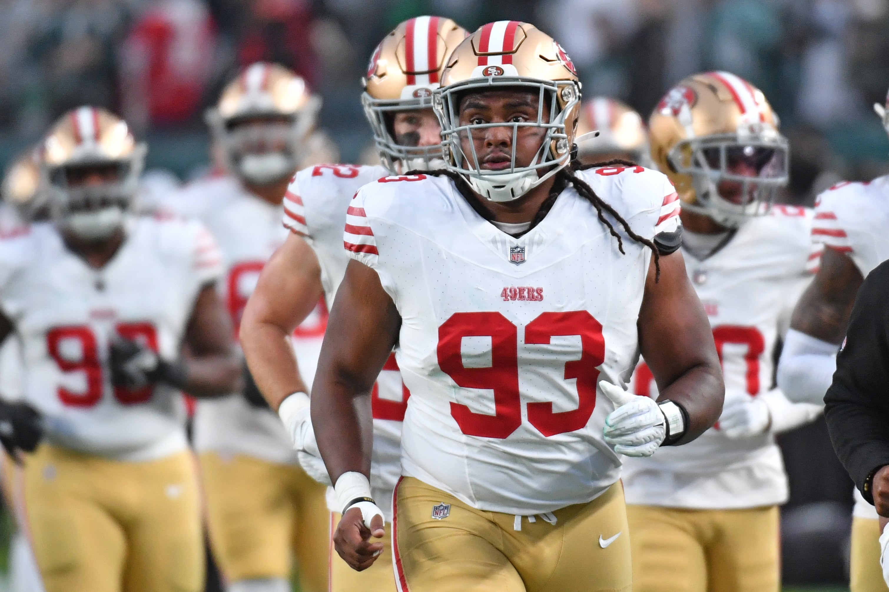 Dec 3, 2023; Philadelphia, Pennsylvania, USA; San Francisco 49ers defensive tackle Kalia Davis (93) runs off the field against the Philadelphia Eagles at Lincoln Financial Field.