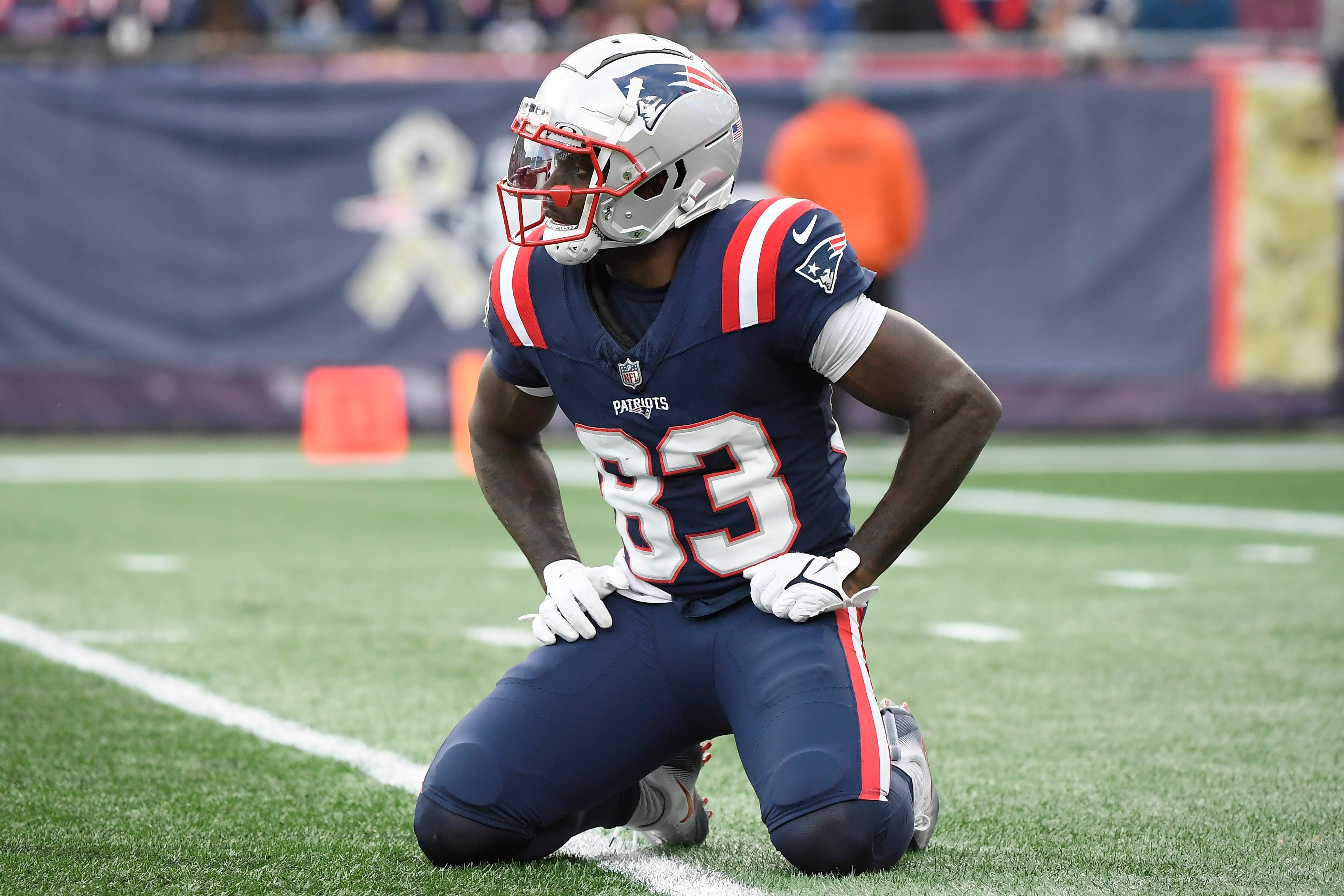 New England Patriots wide receiver Jalen Reagor reacts after having a pass slip through his hands during the second half against the Washington Commanders at Gillette Stadium.