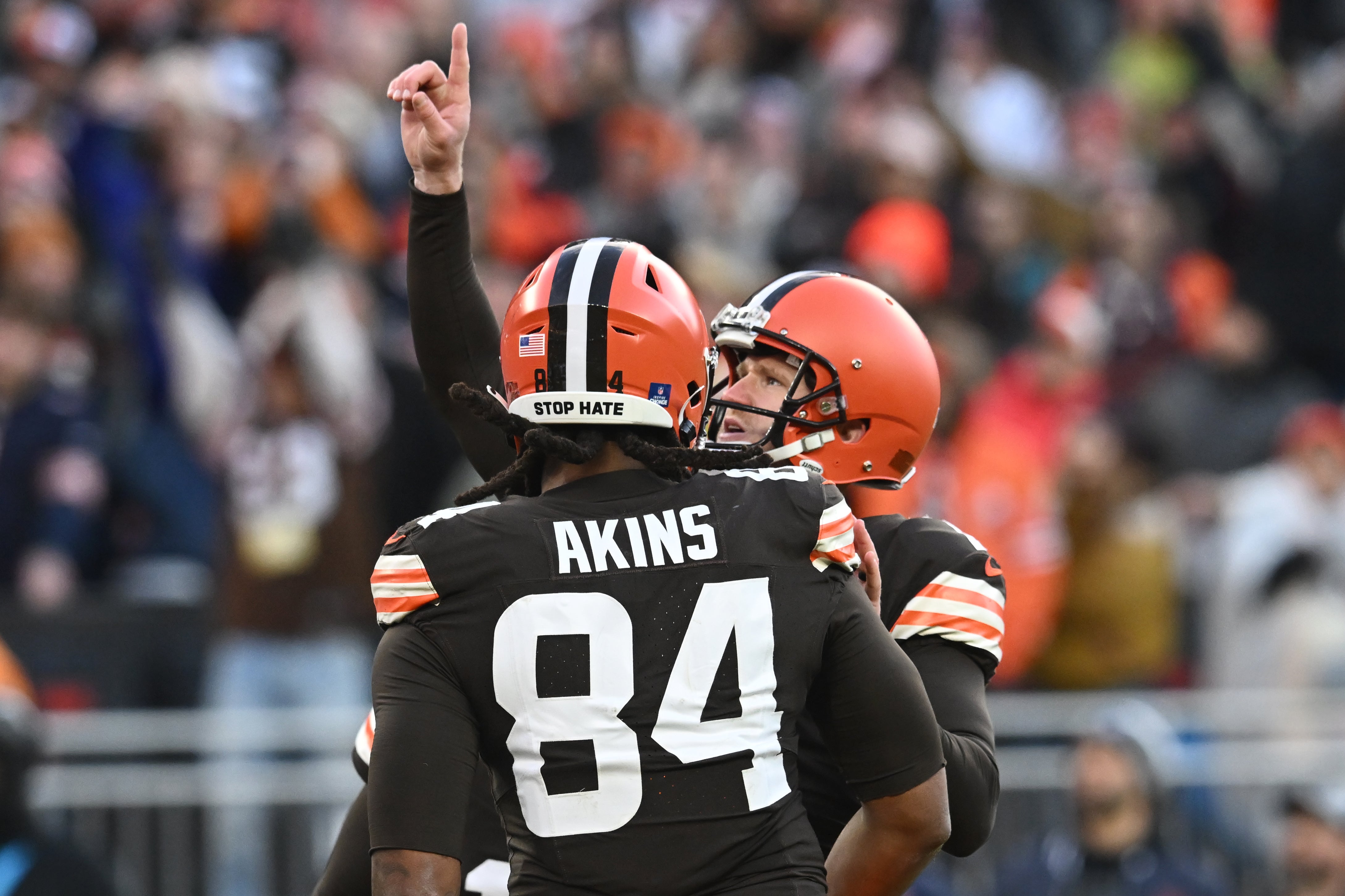 Dec 17, 2023; Cleveland, Ohio, USA; Cleveland Browns tight end Jordan Akins (84) and place kicker Dustin Hopkins (7) celebrate after Hopkins kicked a field goal during the fourth quarter at Cleveland Browns Stadium. Mandatory Credit: Ken Blaze-USA TODAY Sports