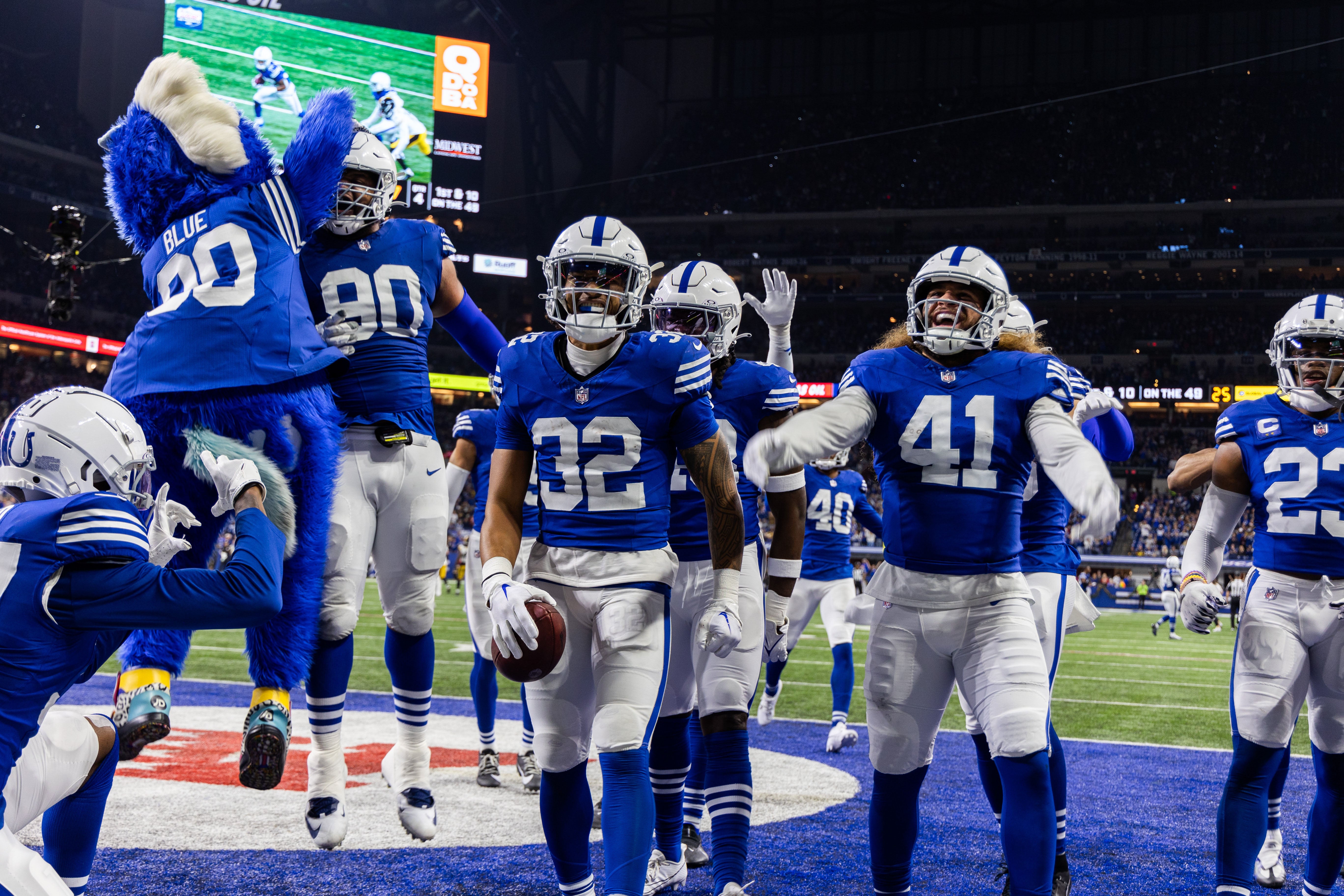 Dec 16, 2023; Indianapolis, Indiana, USA; Indianapolis Colts safety Julian Blackmon (32) celebrates his interception with teammates in the second half against the Pittsburgh Steelers at Lucas Oil Stadium.