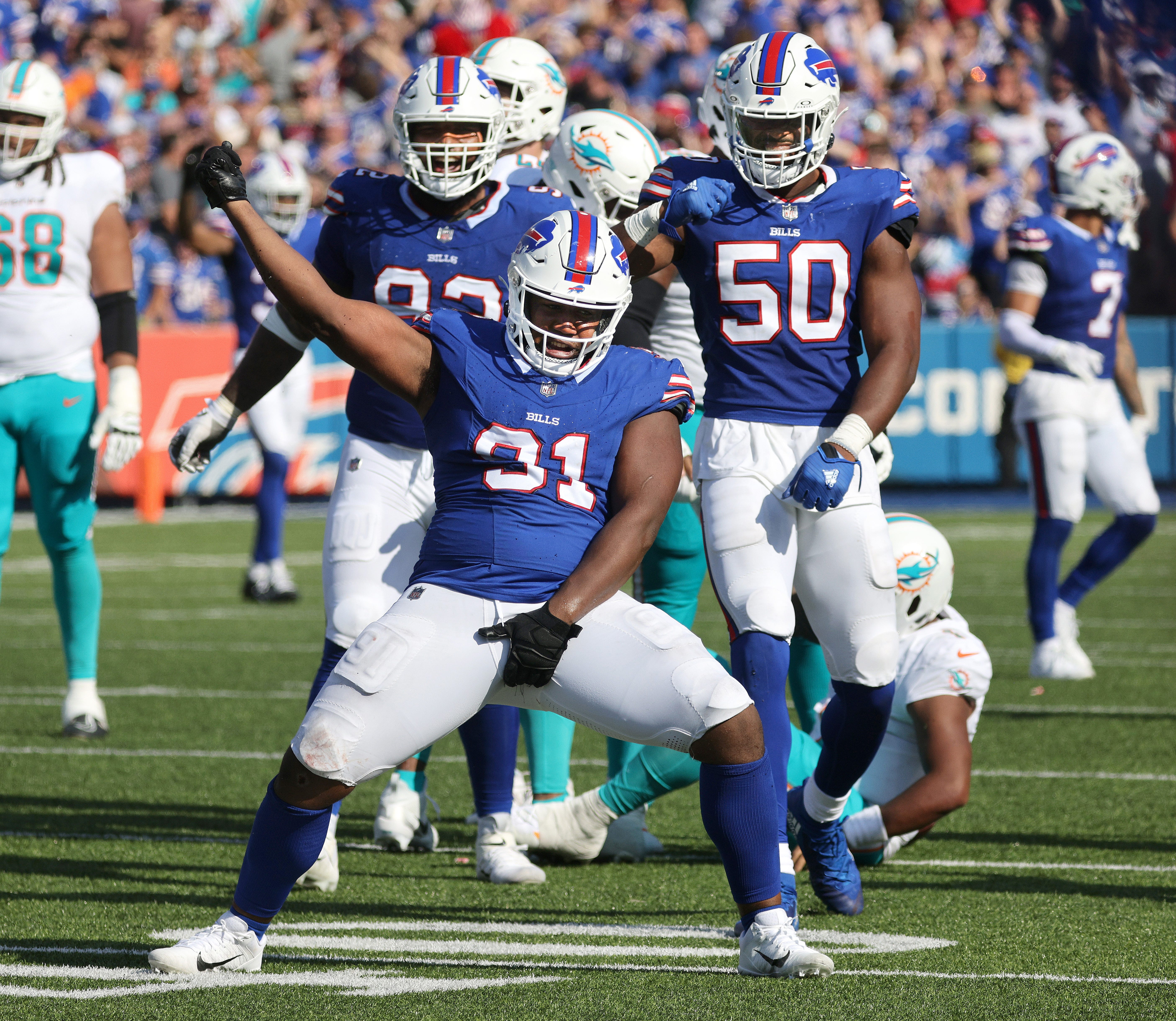 Bills defensive lineman Ed Oliver celebrates his sack.