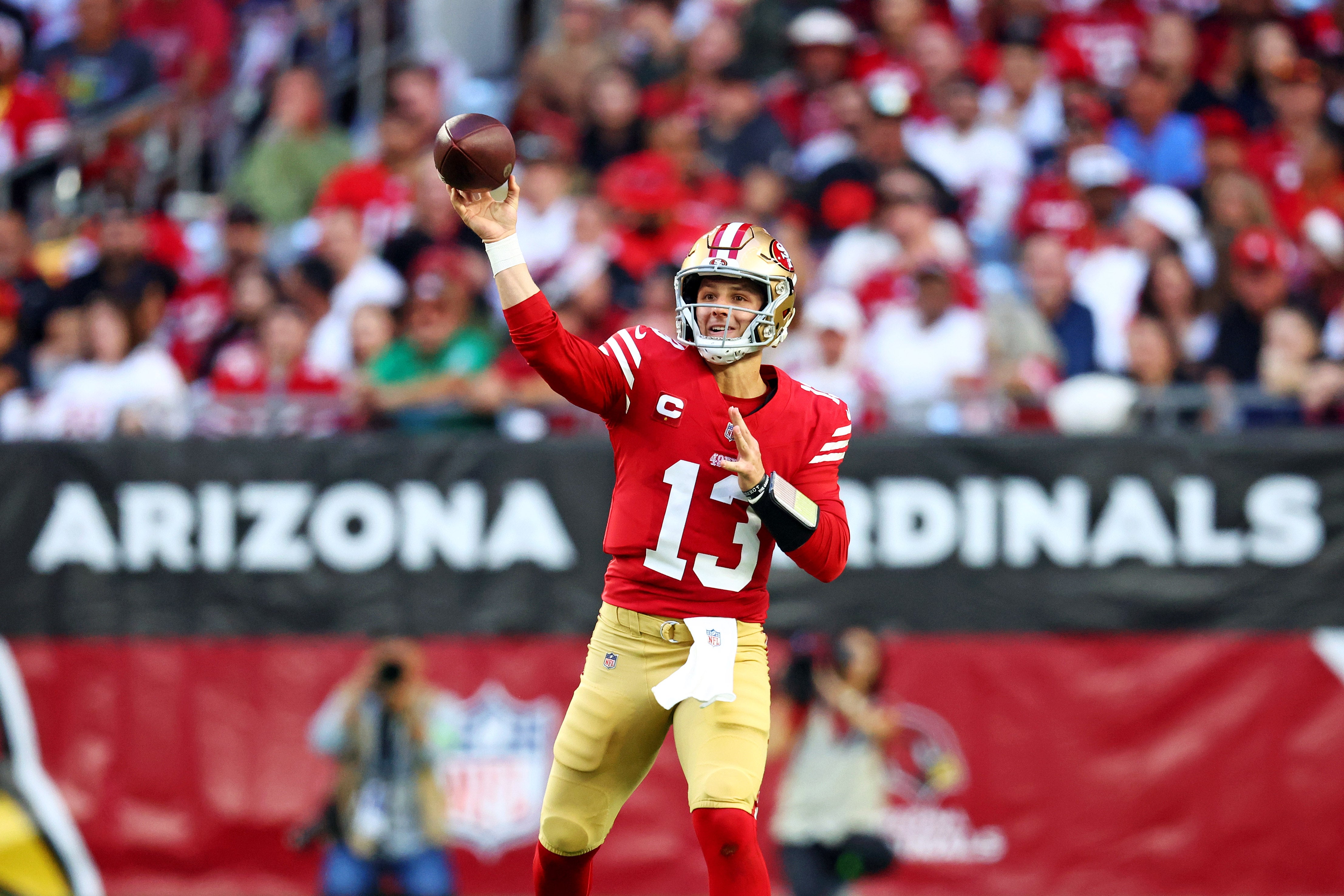 Dec 17, 2023; Glendale, Arizona, USA; San Francisco 49ers quarterback Brock Purdy (13) throws a pass during the second half against the Arizona Cardinals at State Farm Stadium.