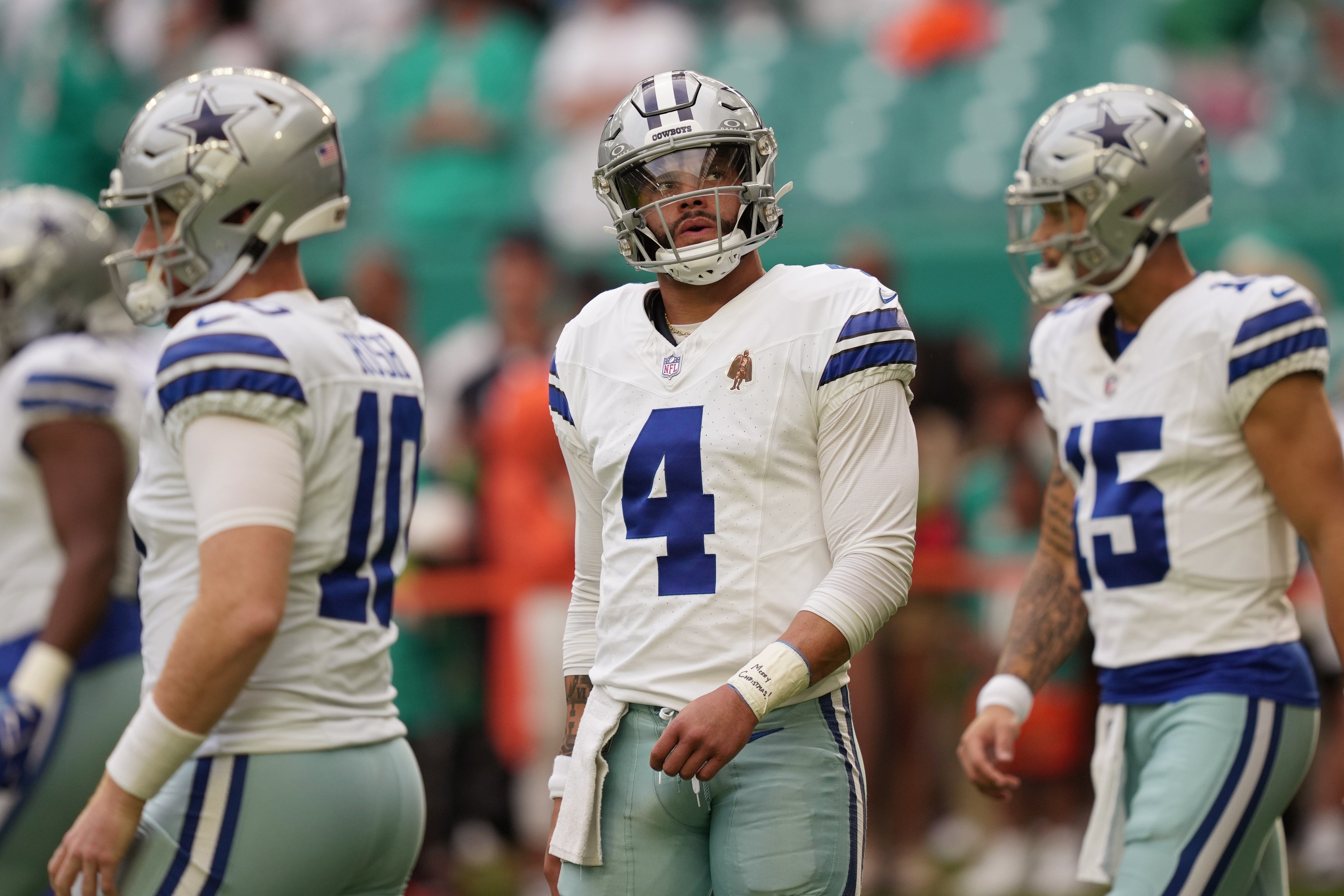 Dallas Cowboys quarterback Dak Prescott (4) warms-up before the NFL game against the Miami Dolphins at Hard Rock Stadium in Miami Gardens, Dec. 24, 2023.  
