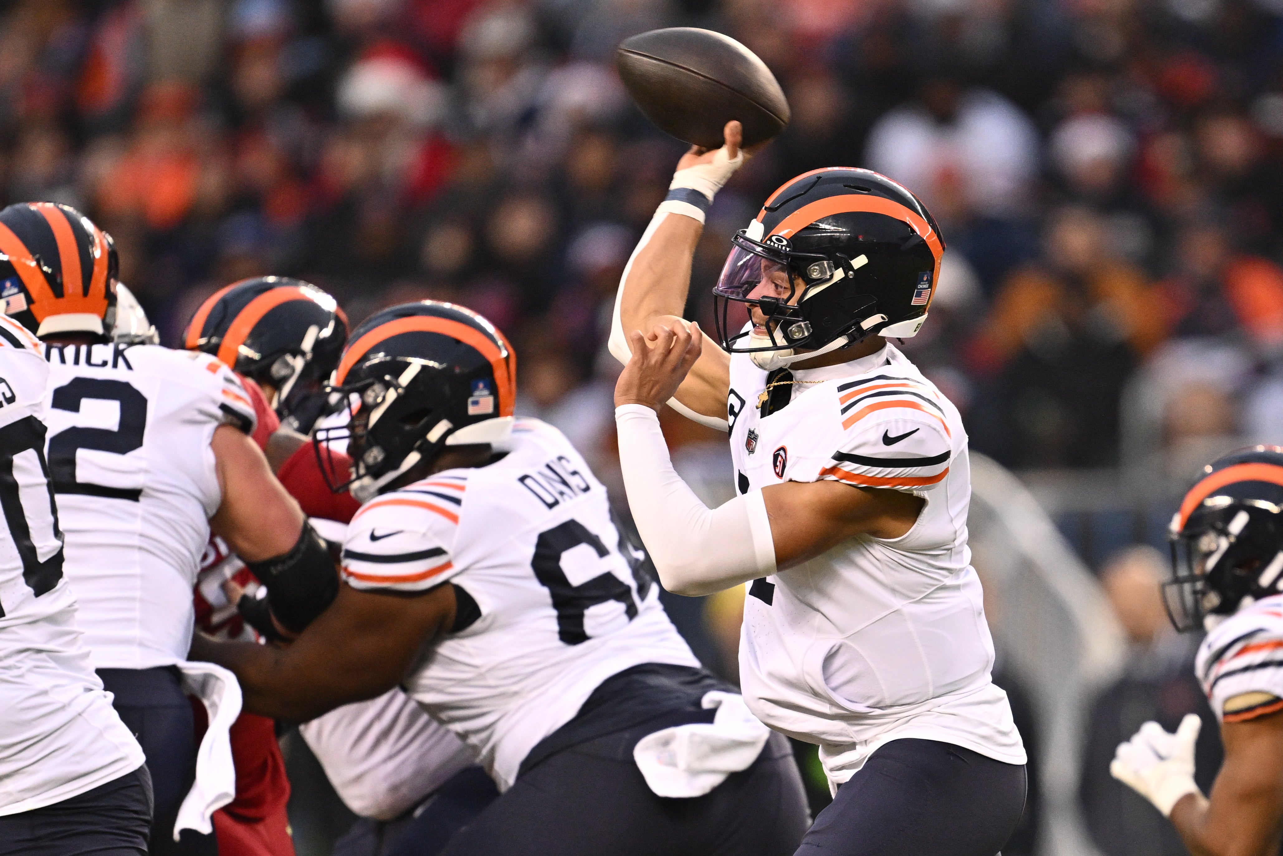 Dec 24, 2023; Chicago, Illinois, USA; Chicago Bears quarterback Justin Fields (1) passes in the first half against the Arizona Cardinals at Soldier Field.