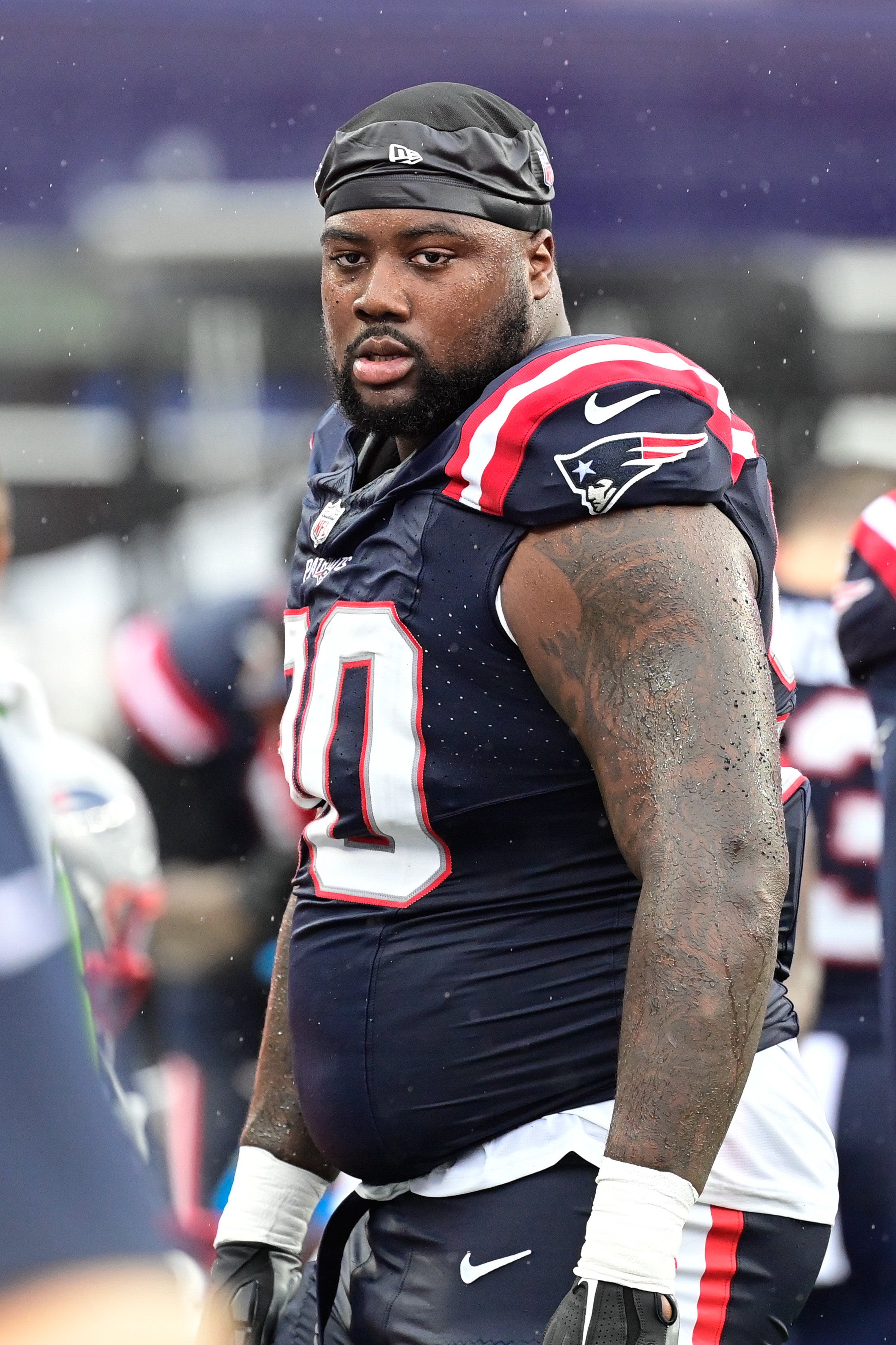 New England Patriots defensive tackle Christian Barmore in the bench area during the first half against the Philadelphia Eagles at Gillette Stadium.