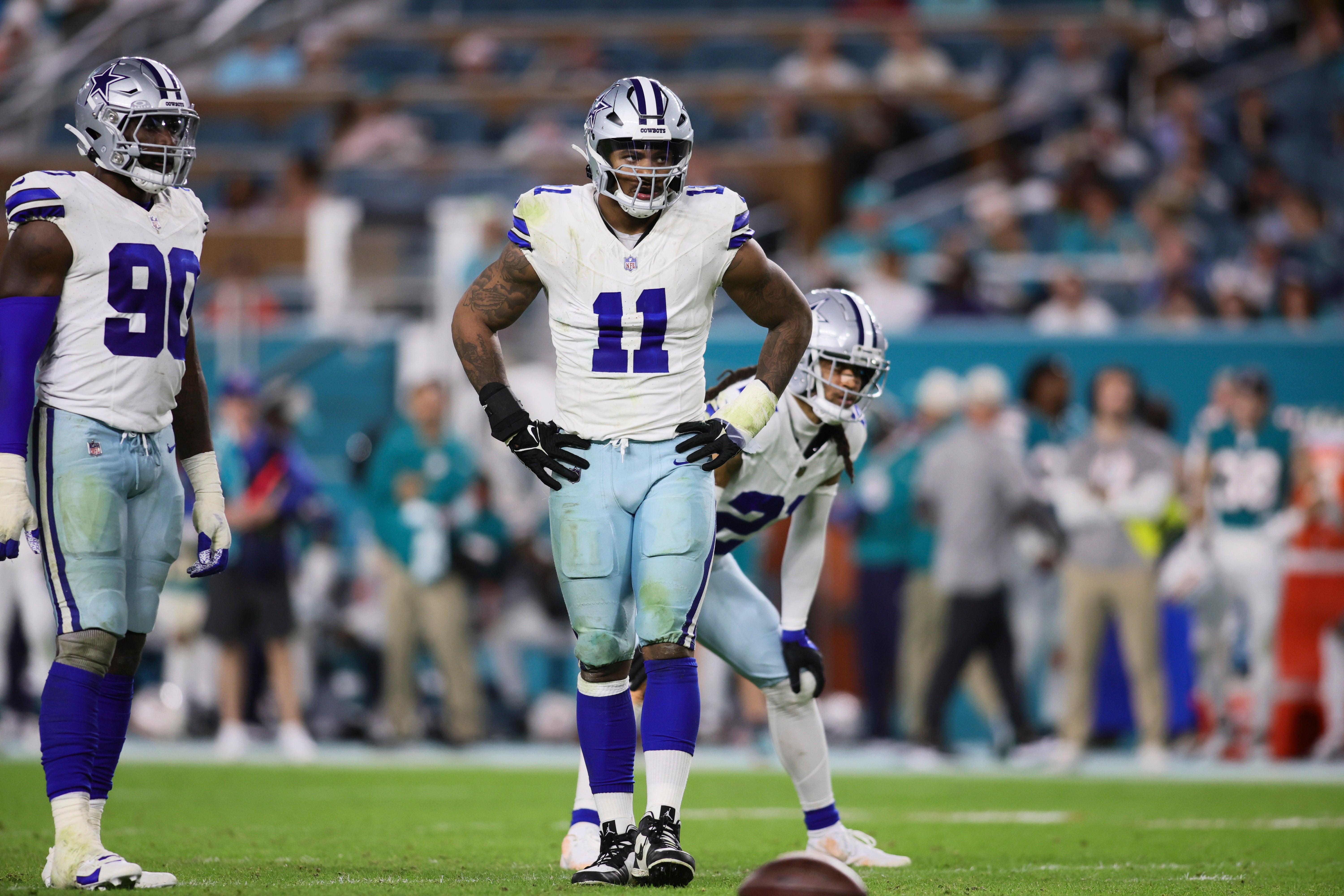 Dallas Cowboys linebacker Micah Parsons (11) looks on against the Miami Dolphins during the fourth quarter at Hard Rock Stadium.