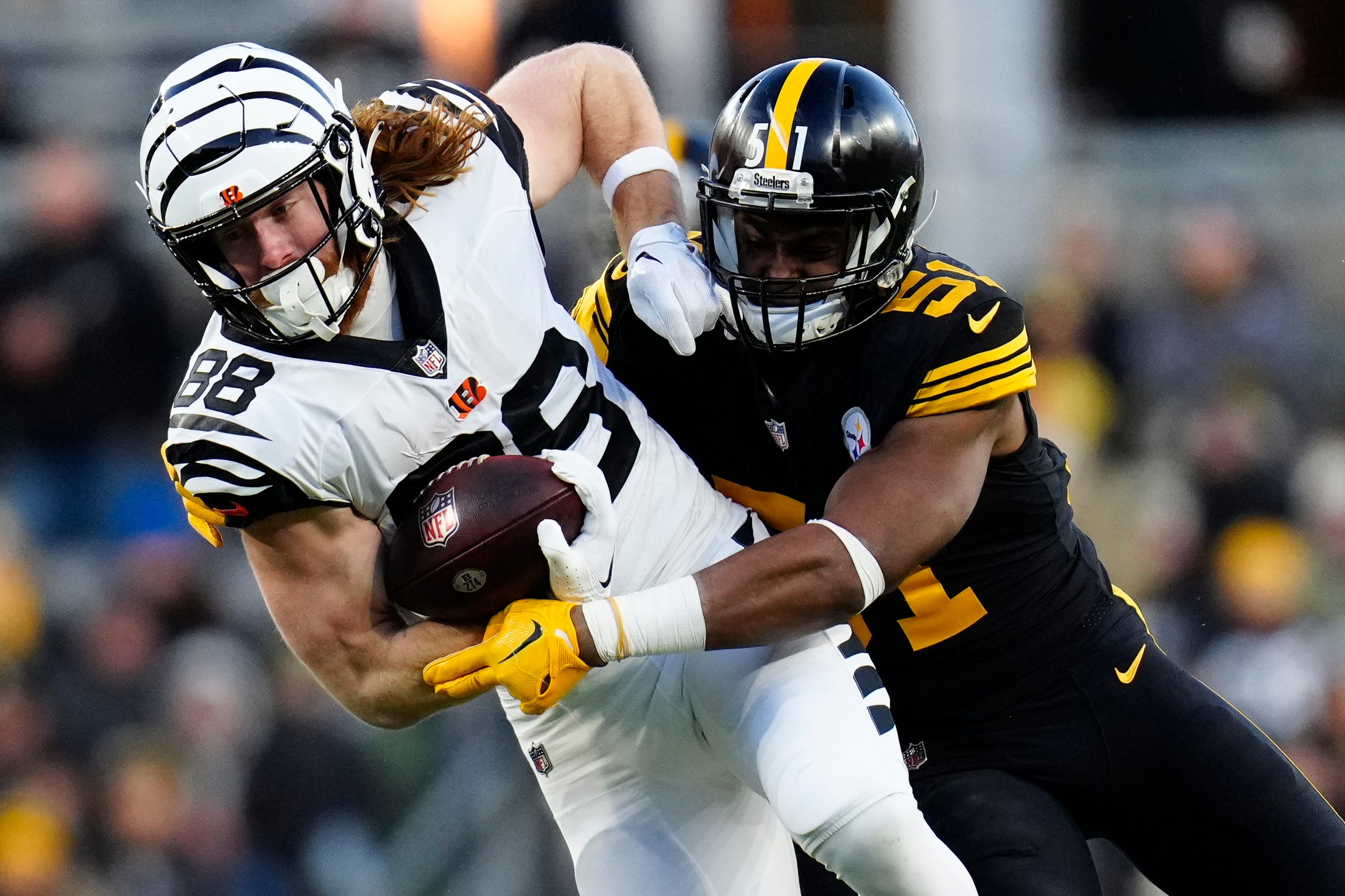 Cincinnati Bengals tight end Hayden Hurst (88) is brought down by Pittsburgh Steelers linebacker Myles Jack (51) on a reception in the first quarter of of the NFL Week 11 game between the Pittsburgh Steelers and the Cincinnati Bengals at Acrisure Stadium in Pittsburgh on Sunday, Nov. 20, 2022. The Steelers led 20-17 at halftime. Cincinnati Bengals At Pittsburgh Steelers Week 11
