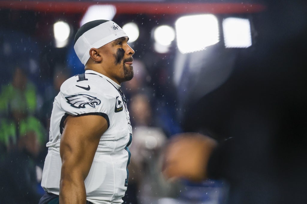Philadelphia Eagles quarterback Jalen Hurts (1) participates in pregame warmups against the Seattle Seahawks at Lumen Field.