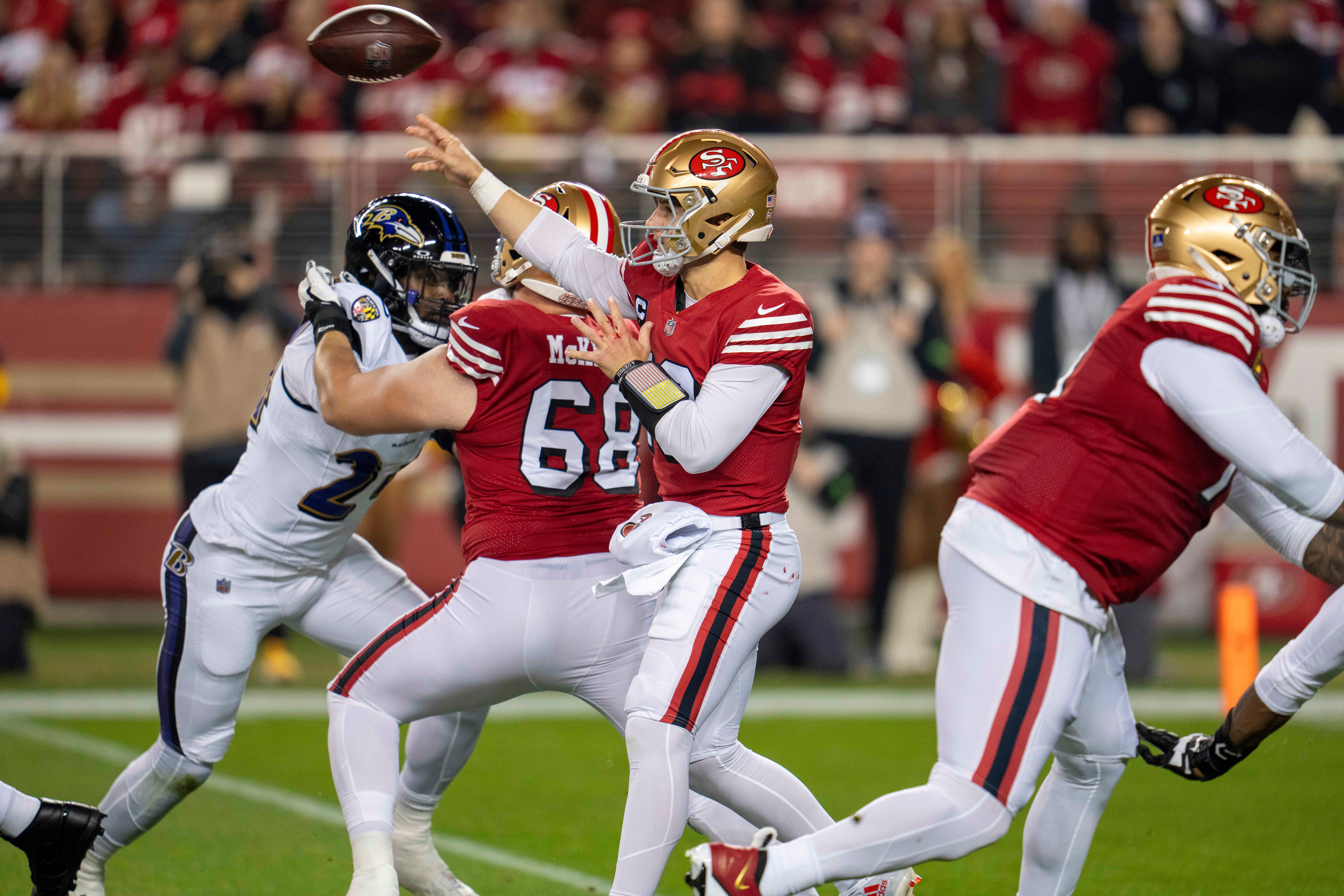 Dec 25, 2023; Santa Clara, California, USA; San Francisco 49ers quarterback Brock Purdy (13) passes the football against the Baltimore Ravens during the first quarter at Levi's Stadium.
