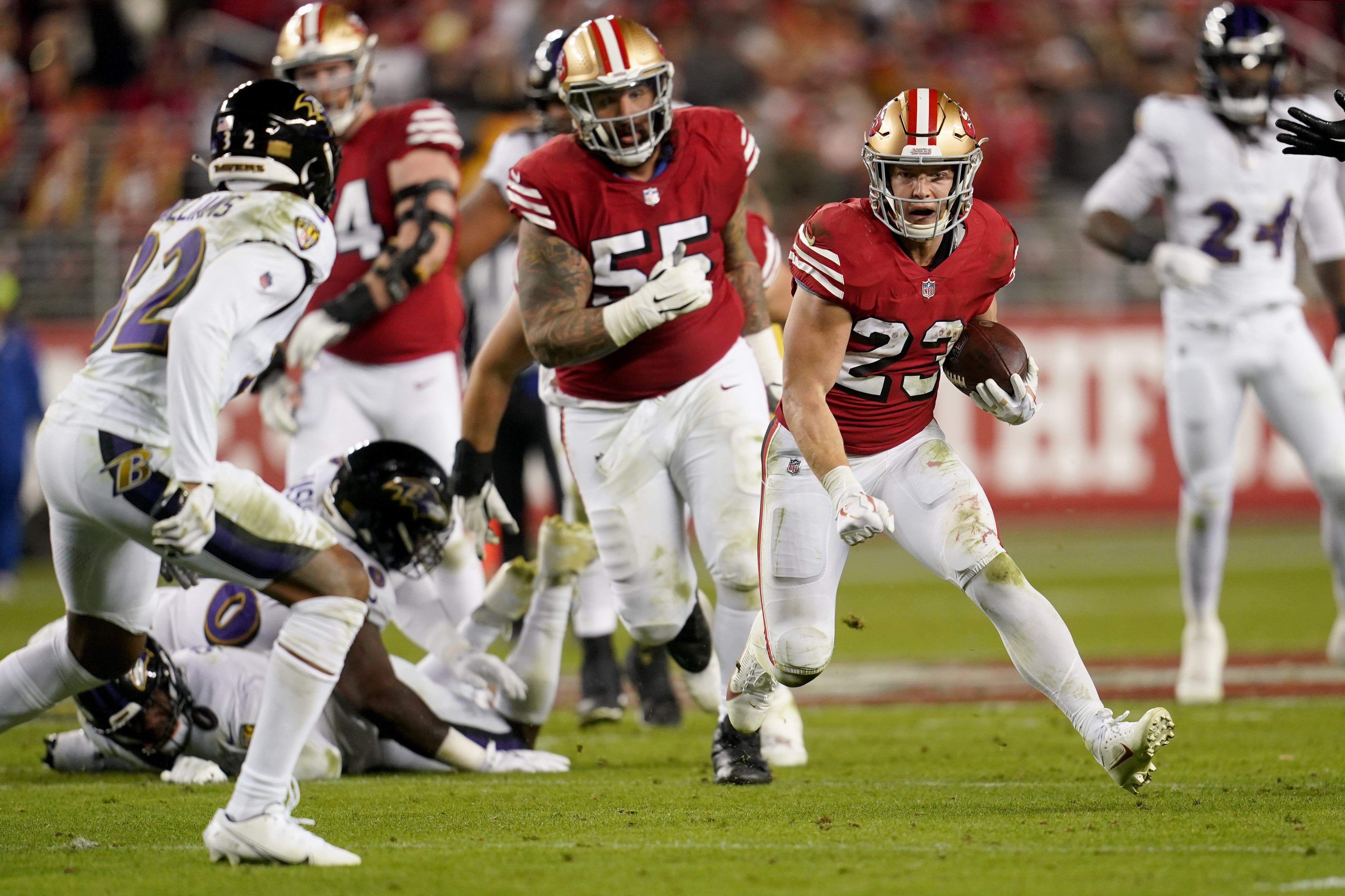 Dec 25, 2023; Santa Clara, California, USA; San Francisco 49ers running back Christian McCaffrey (23) runs the ball against the Baltimore Ravens in the third quarter at Levi's Stadium.