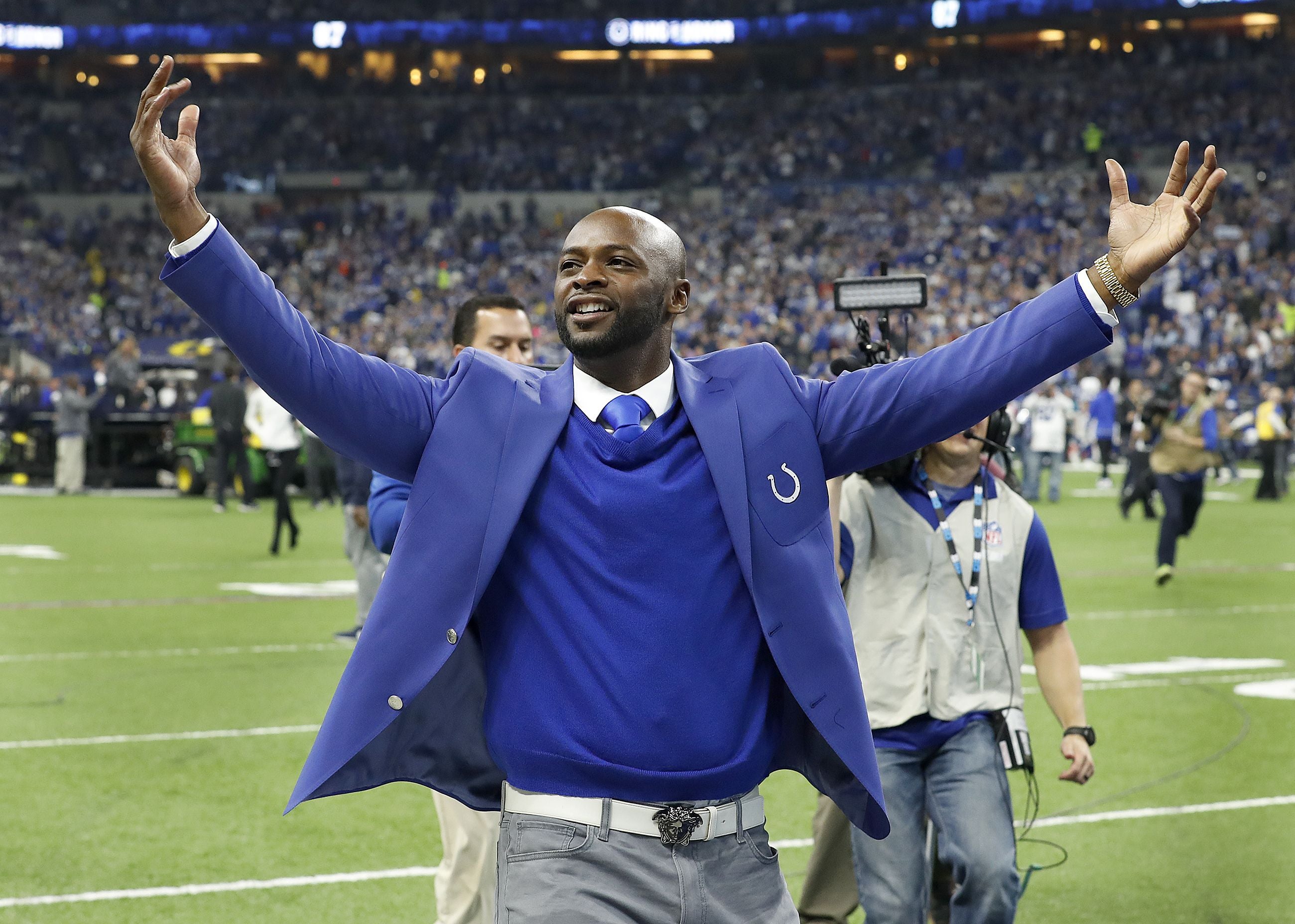 Former Indianapolis Colts Reggie Wayne greets his fans in the Northeast corner of the stadium after he was inducted into the Colts Ring of Honor during halftime of the Colts game against the Tennessee Titans at Lucas Oil Stadium on Sunday, Nov. 18, 2018. The Indianapolis Colts Host The Tennessee Titans In Nfl Action
