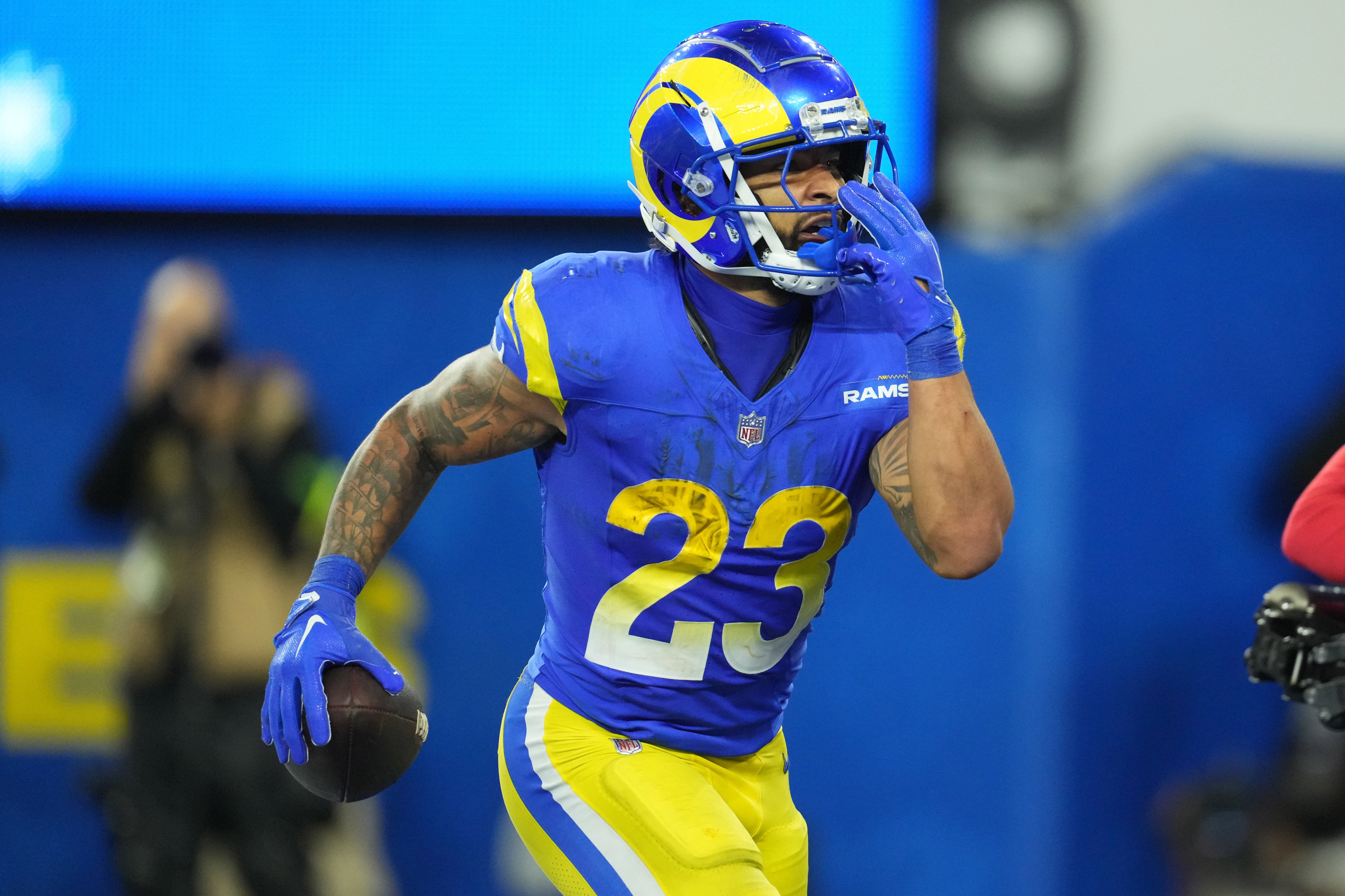 Dec 21, 2023; Inglewood, California, USA; Los Angeles Rams running back Kyren Williams (23) reacts after a touchdown against the New Orleans Saints in the second half at SoFi Stadium. Mandatory Credit: Kirby Lee-USA TODAY Sports