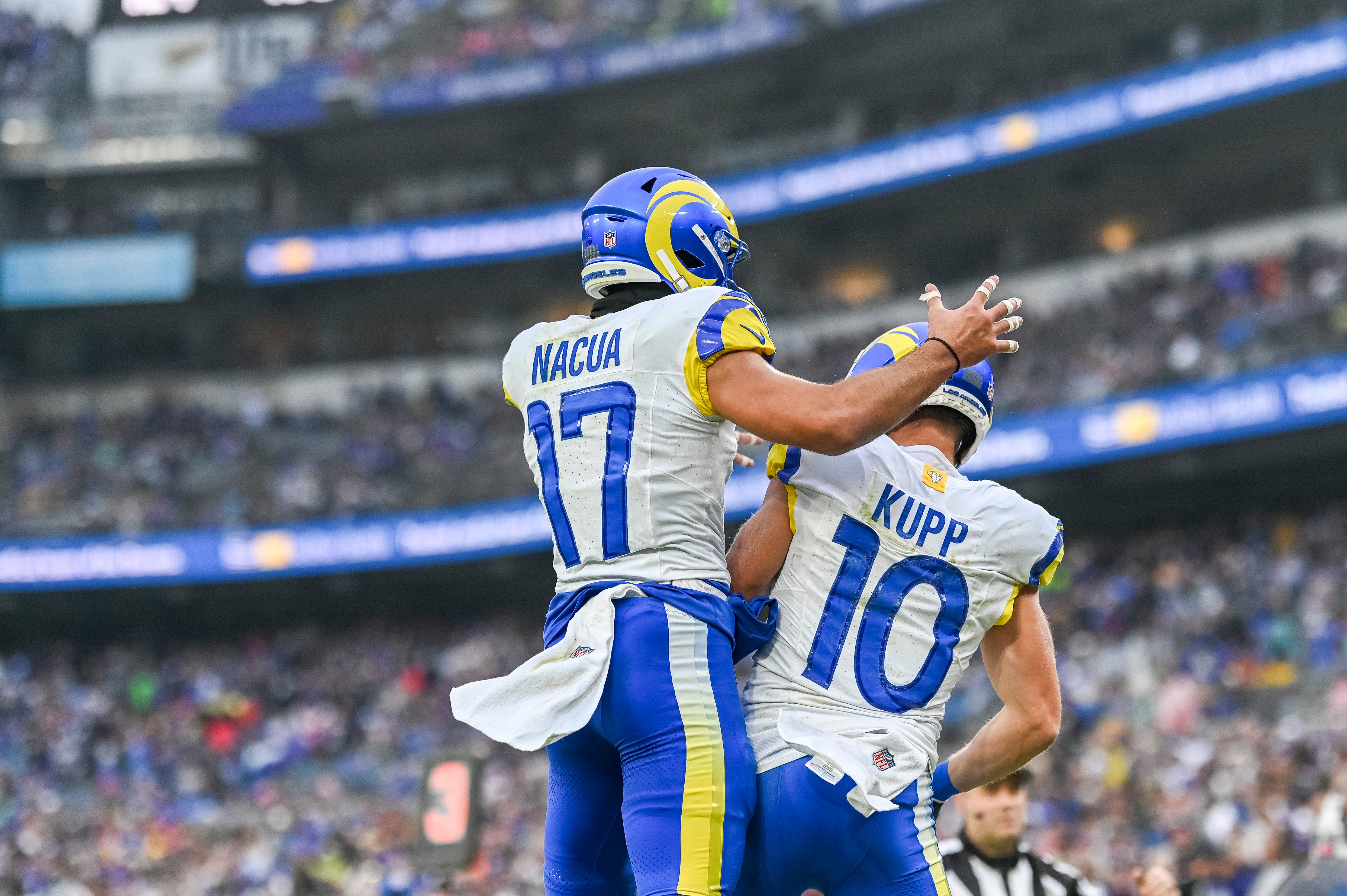 Dec 10, 2023; Baltimore, Maryland, USA; Los Angeles Rams wide receiver Cooper Kupp (10) celebrates with wide receiver Puka Nacua (17) after scoring a second quarter touchdown during the at M&T Bank Stadium. Mandatory Credit: Tommy Gilligan-USA TODAY Sports