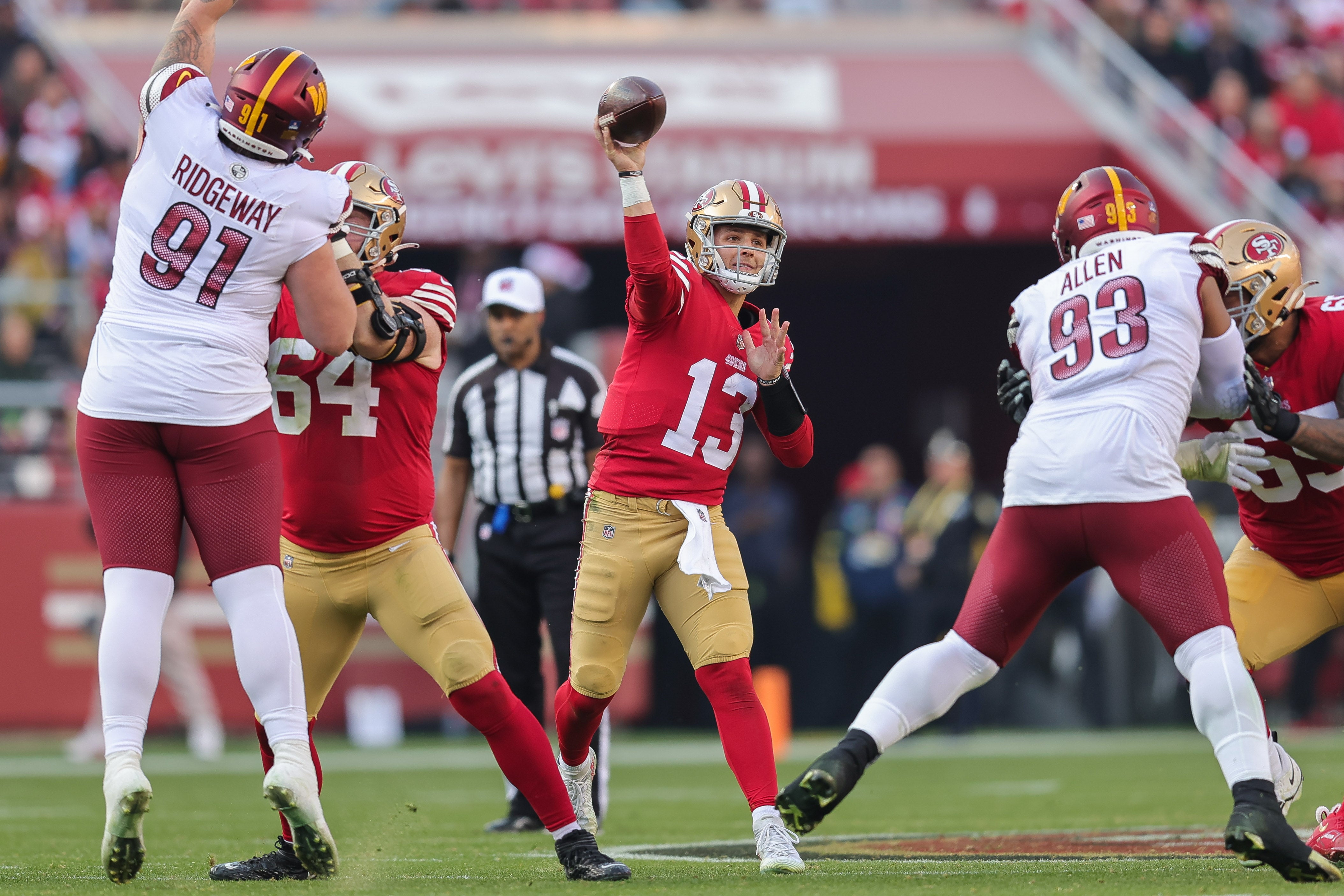 Dec 24, 2022; Santa Clara, California, USA; San Francisco 49ers quarterback Brock Purdy (13) throws a pass during the third quarter against the Washington Commanders at Levi's Stadium.