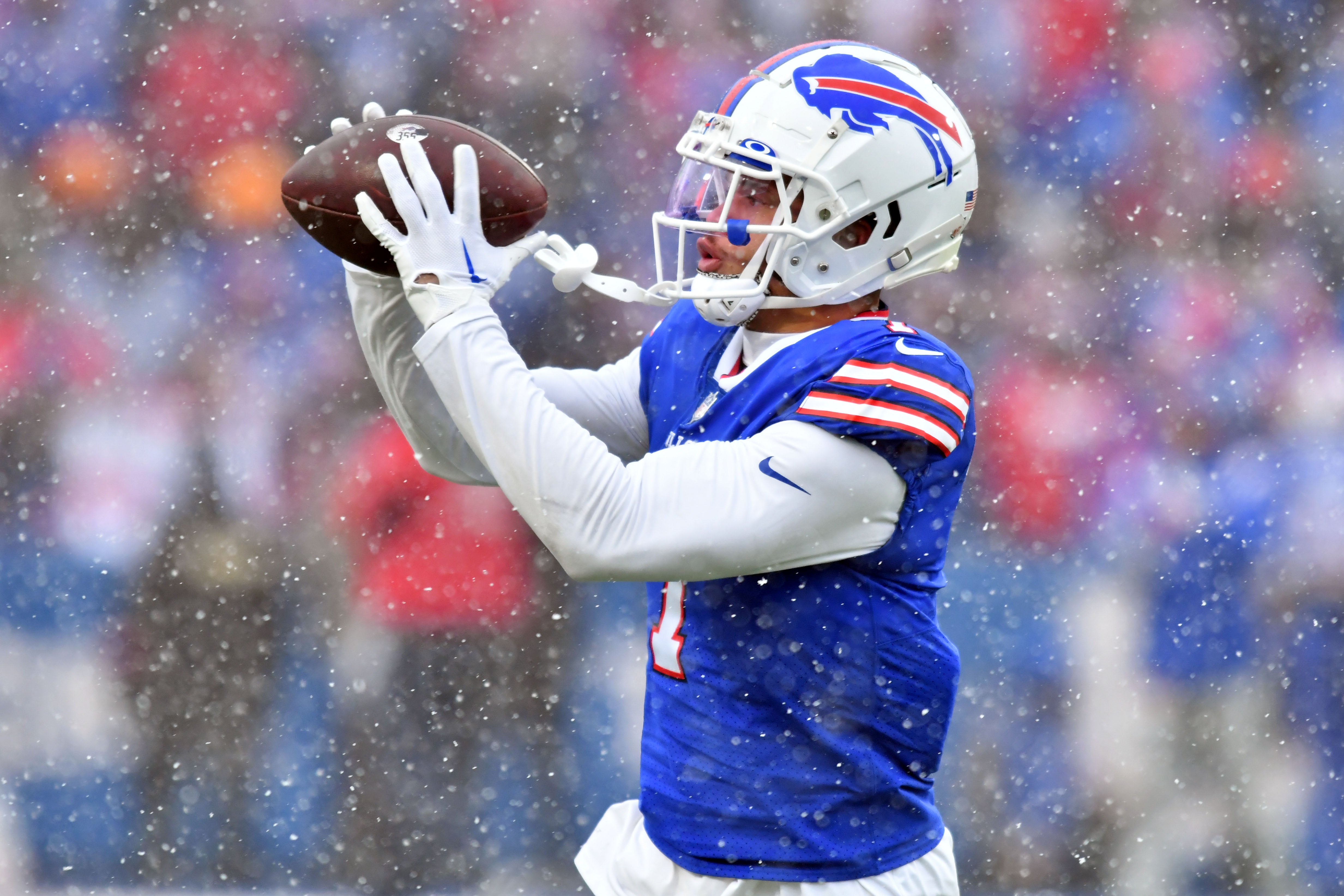 Buffalo Bills cornerback Taron Johnson (7) warms up before an AFC divisional round game between the Buffalo Bills and the Cincinnati Bengals at Highmark Stadium.