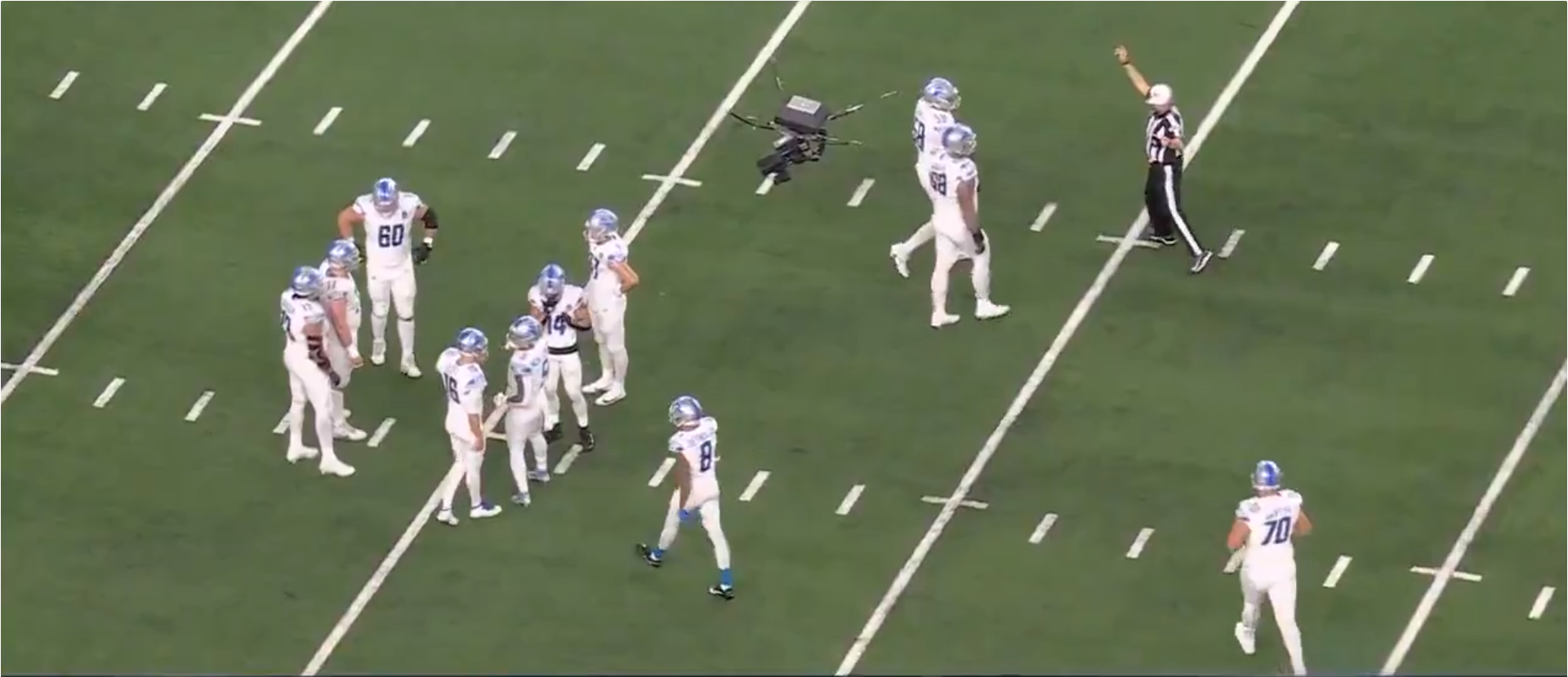 Detroit Lions OT Taylor Decker approaches refs in loss to Dallas Cowboys.