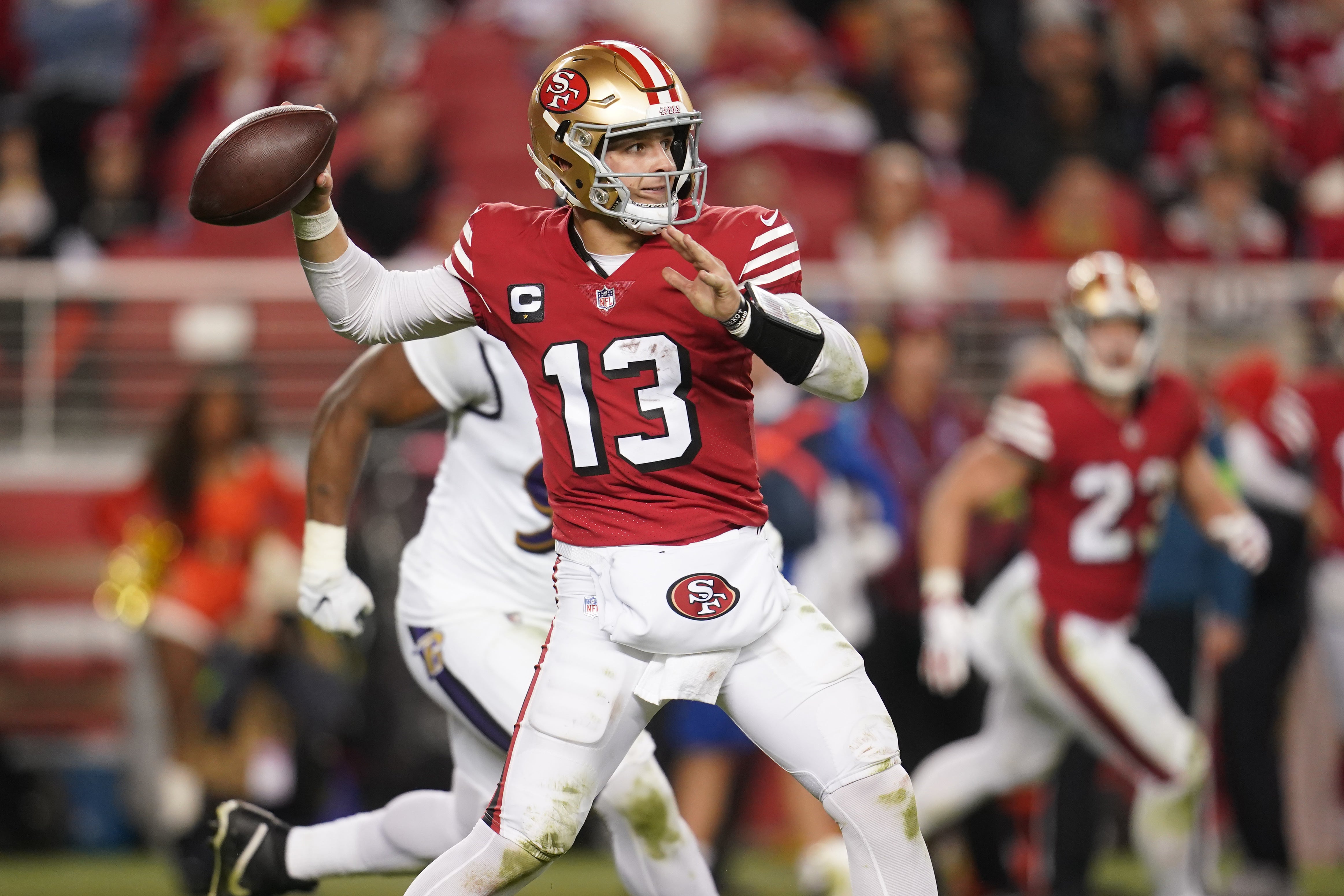 Dec 25, 2023; Santa Clara, California, USA; San Francisco 49ers quarterback Brock Purdy (13) throws a pass against the Baltimore Ravens in the fourth quarter at Levi's Stadium.