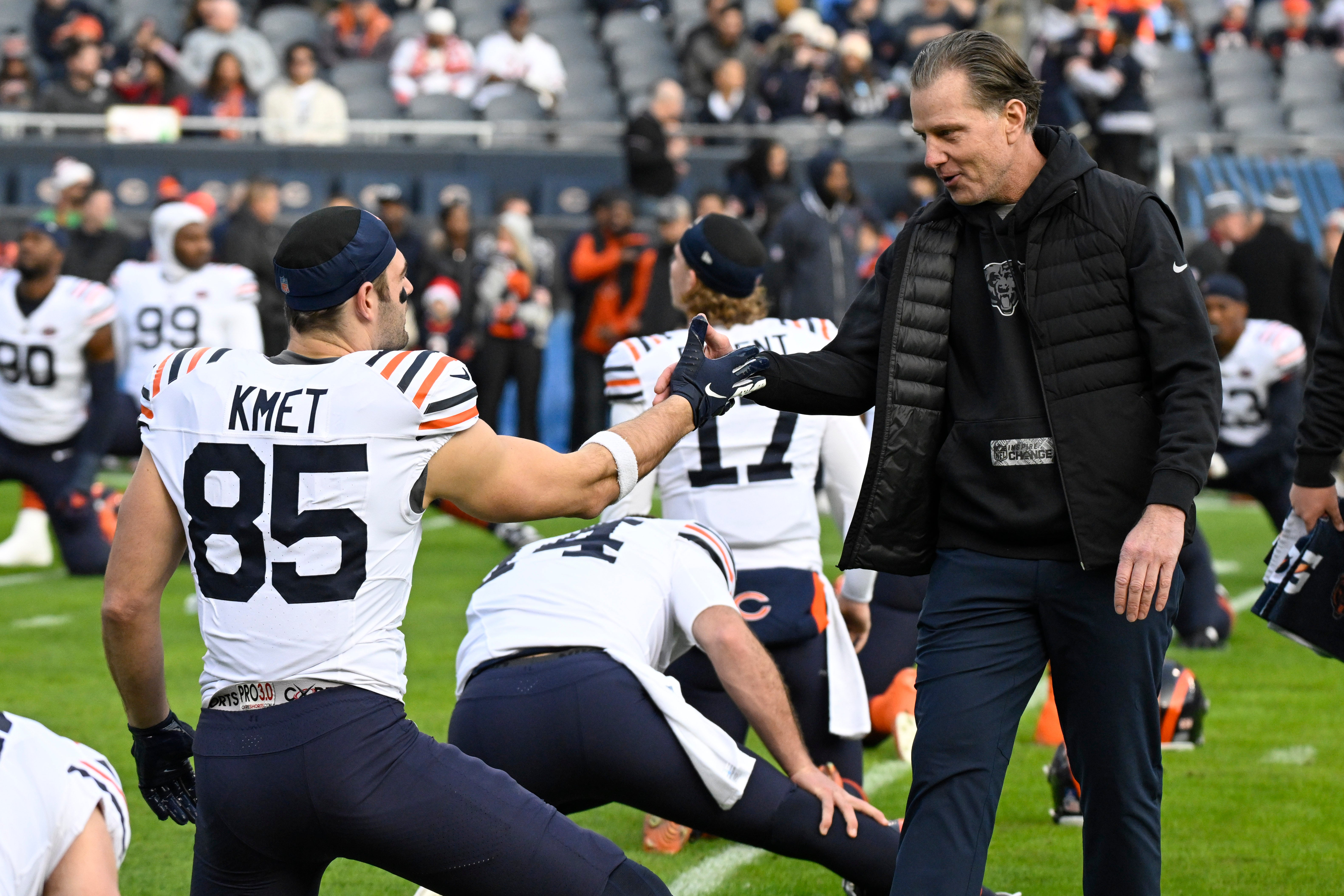 Dec 24, 2023; Chicago, Illinois, USA; Chicago Bears head coach Matt Eberflus greets Chicago Bears tight end Cole Kmet (85) before the team s game against the Arizona Cardinals at Soldier Field.