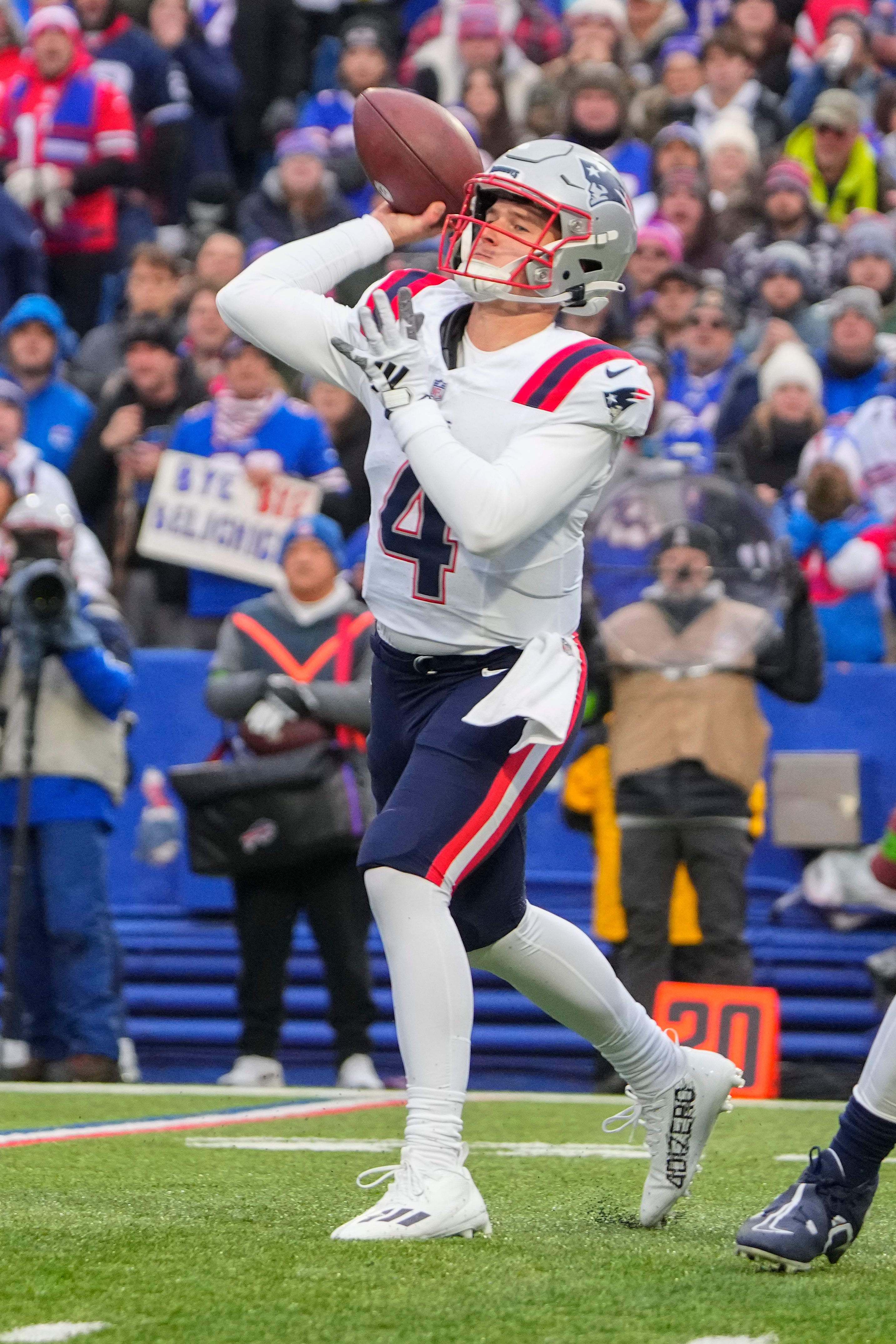 New England Patriots quarterback Bailey Zappe throws the ball against the Buffalo Bills during the first half at Highmark Stadium.