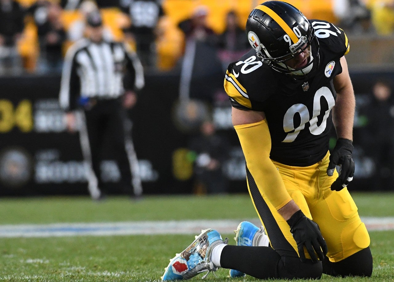Dec 3, 2023; Pittsburgh, Pennsylvania, USA; Pittsburgh Steelers linebacker T.J. Watt (90) is slow getting up after a play against the Arizona Cardinals during the third quarter at Acrisure Stadium. Mandatory Credit: Philip G. Pavely-USA TODAY Sports