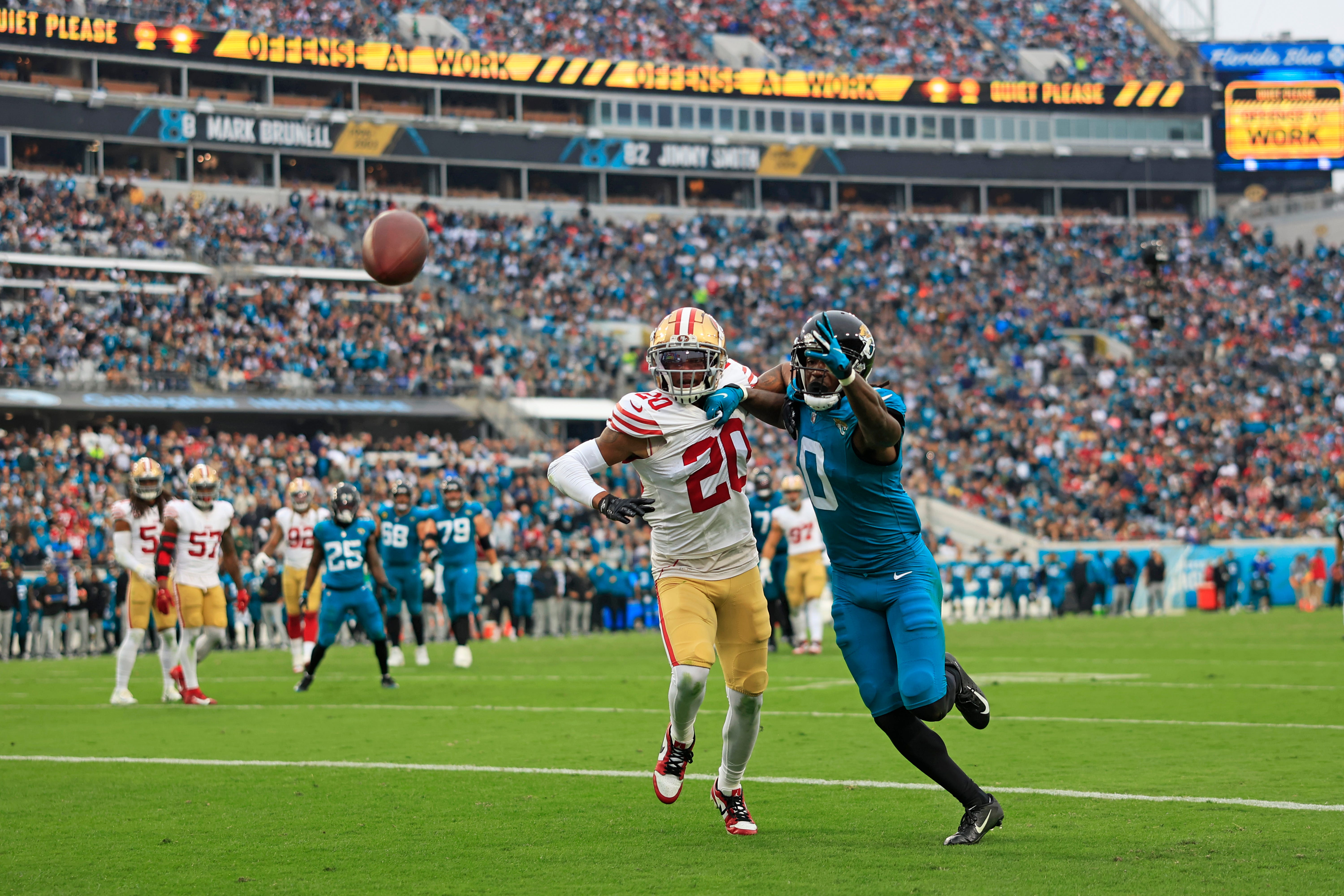A pass is overthrown intended for Jacksonville Jaguars wide receiver Calvin Ridley (0) as San Francisco 49ers cornerback Ambry Thomas (20) defends during the third quarter of an NFL football game Sunday, Nov. 12, 2023 at EverBank Stadium in Jacksonville, Fla. The San Francisco 49ers defeated the Jacksonville Jaguars 34-3.