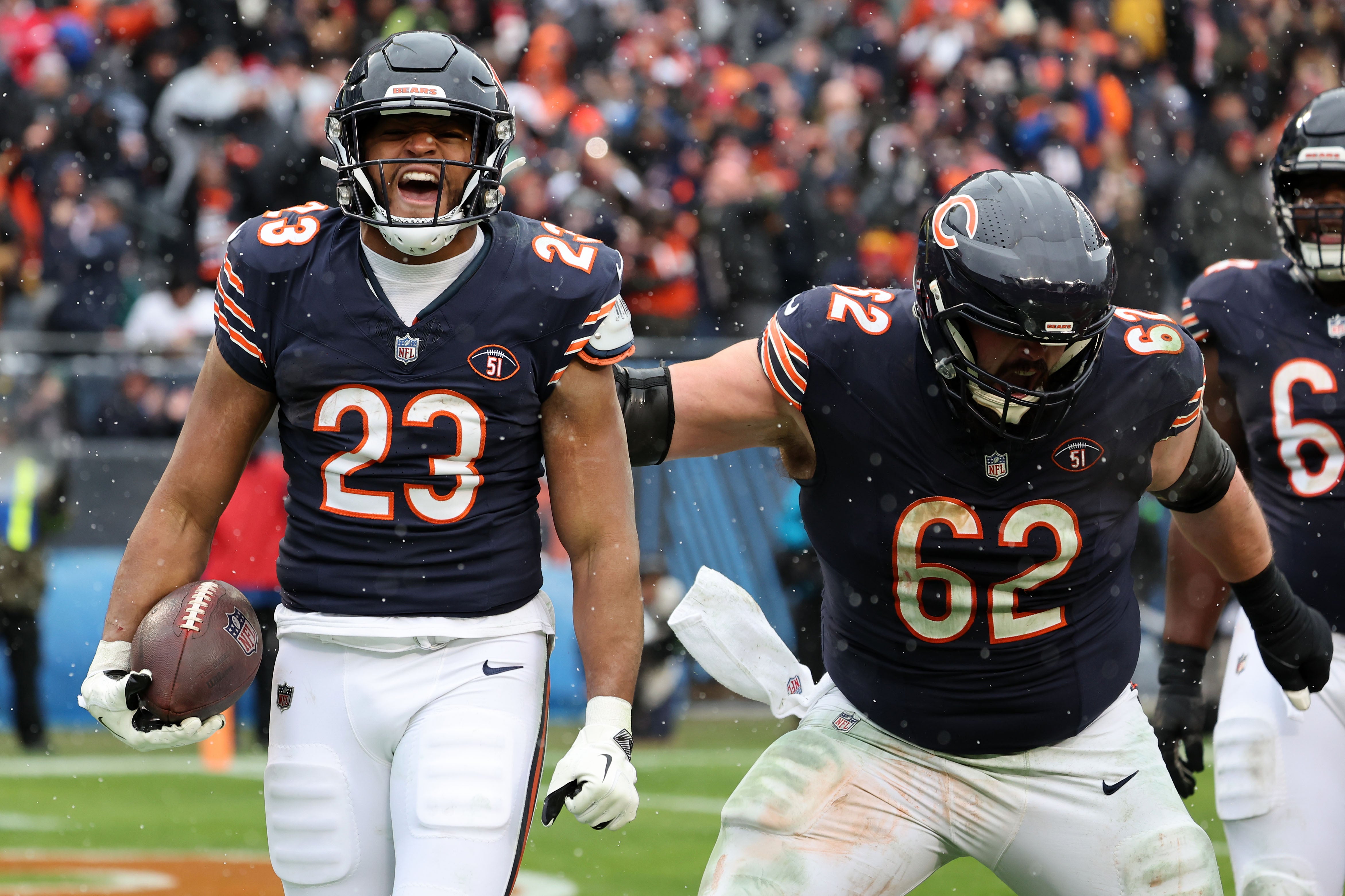 Dec 31, 2023; Chicago, Illinois, USA; Chicago Bears running back Roschon Johnson (23) reacts after scoring a touchdown against the Atlanta Falcons during the first half at Soldier Field.