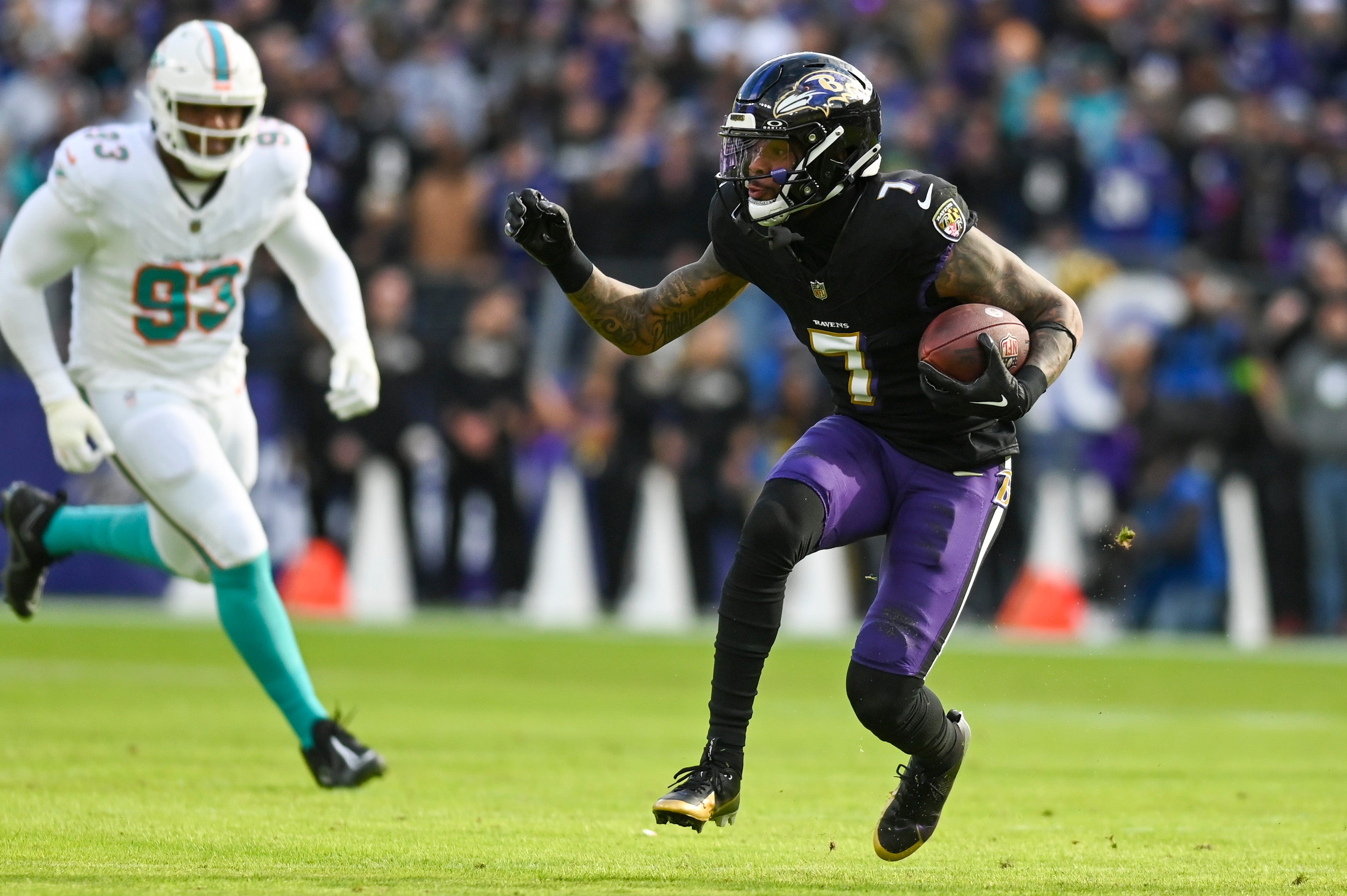 Baltimore Ravens wide receiver Rashod Bateman (7) runs after the catch during the first quarter against the Miami Dolphins at M&T Bank Stadium.