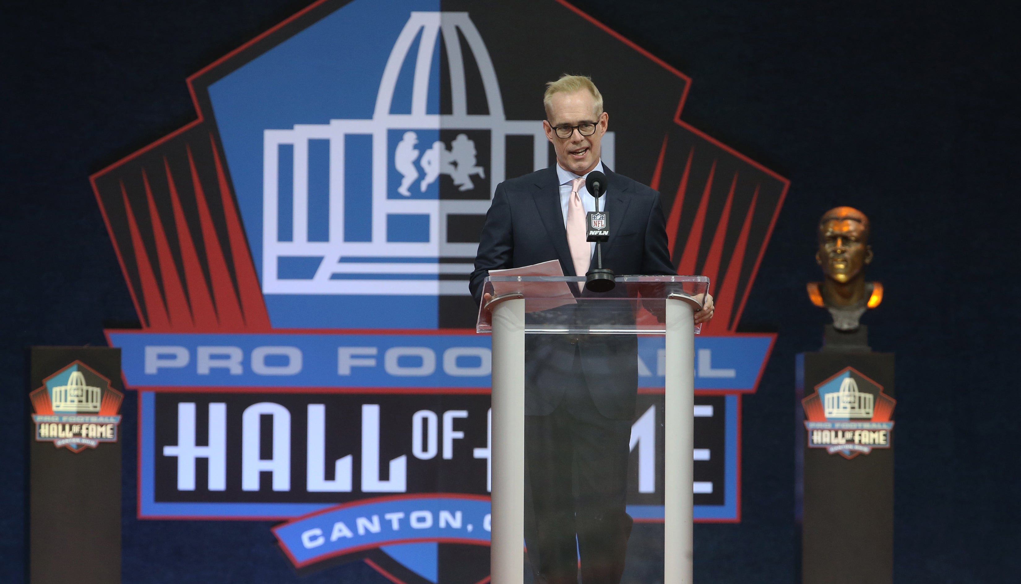 Aug 7, 2021; Canton, Ohio, USA; Broadcaster Joe Buck accepts the 2020 Pete Rozelle Award during the Professional Football HOF enshrinement ceremonies at Tom Benson Hall of Fame Stadium.
