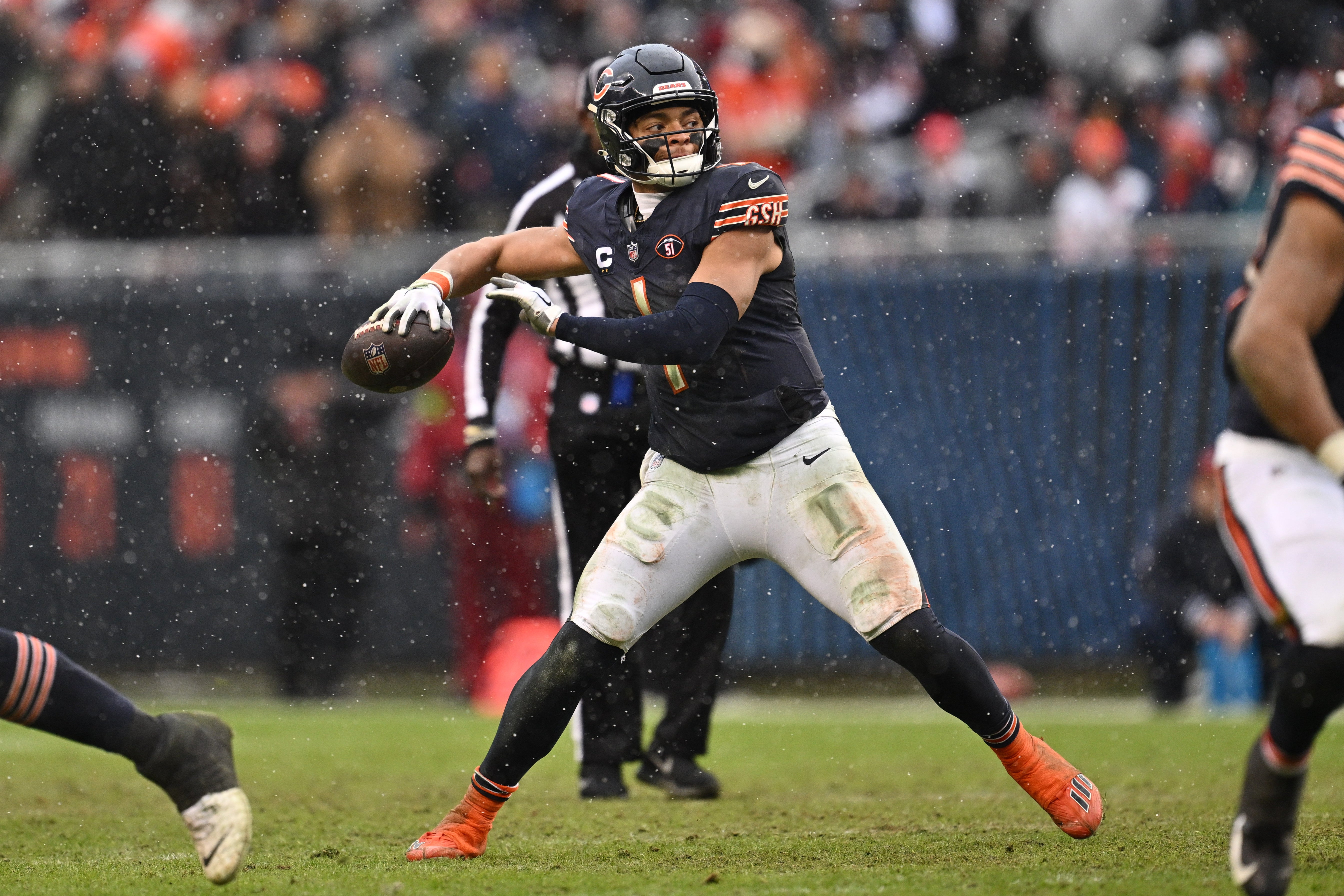 Chicago Bears quarterback Justin Fields (1) passes in the second half against the Atlanta Falcons at Soldier Field.