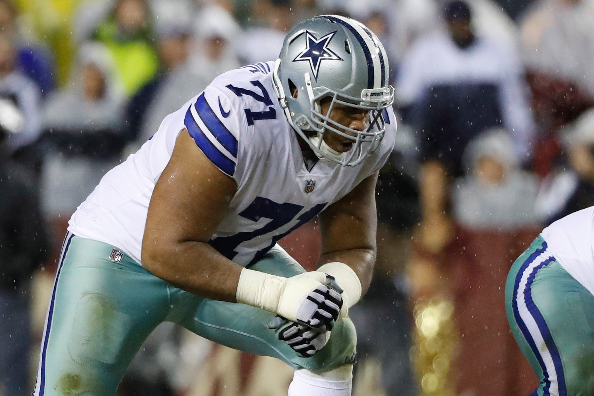Dallas Cowboys offensive tackle La'el Collins (71) gets into an altercation with Washington Football Team defensive end Will Bradley-King (56) after his hit on Cowboys quarterback Dak Prescott (not pictured) during the fourth quarter at FedExField.