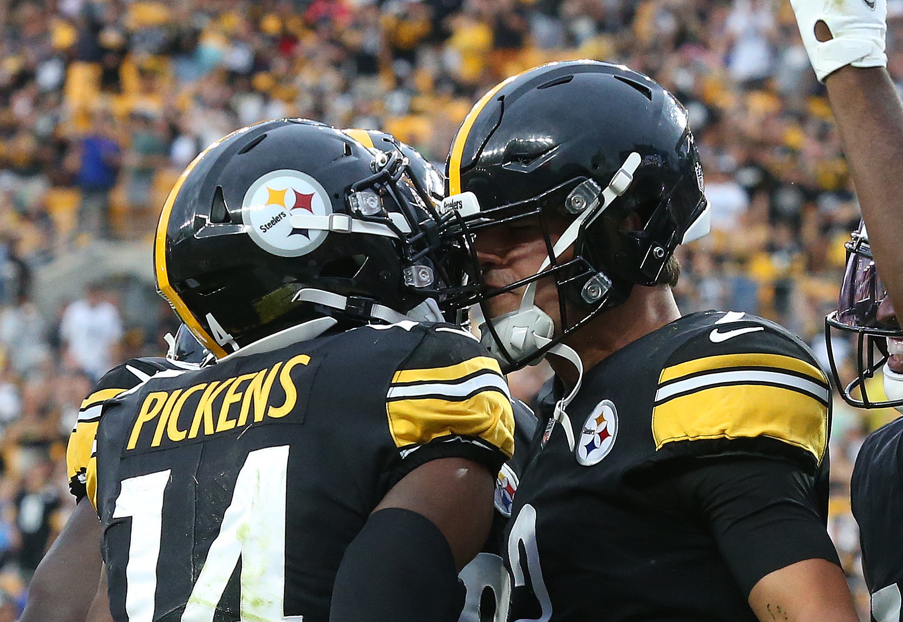 Aug 13, 2022; Pittsburgh, Pennsylvania, USA; Pittsburgh Steelers wide receiver George Pickens (14) and quarterback Mason Rudolph (2) celebrate after combining for a passing touchdown against the Seattle Seahawks during the first quarter at Acrisure Stadium. The Steelers won 32-25. Mandatory Credit: Charles LeClaire-USA TODAY Sports