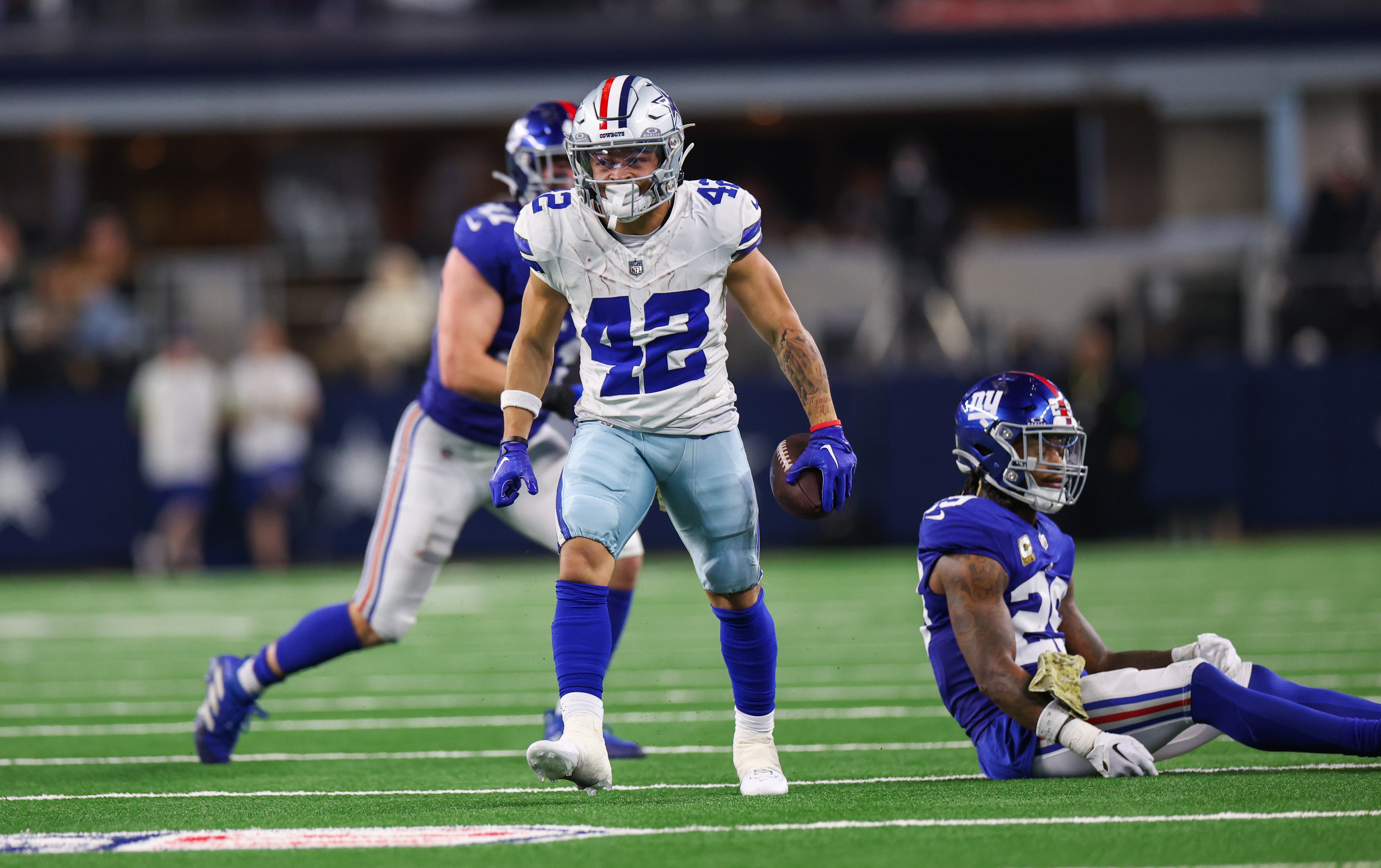 Dallas Cowboys running back Deuce Vaughn (42) reacts during the second half against the New York Giants at AT&T Stadium.