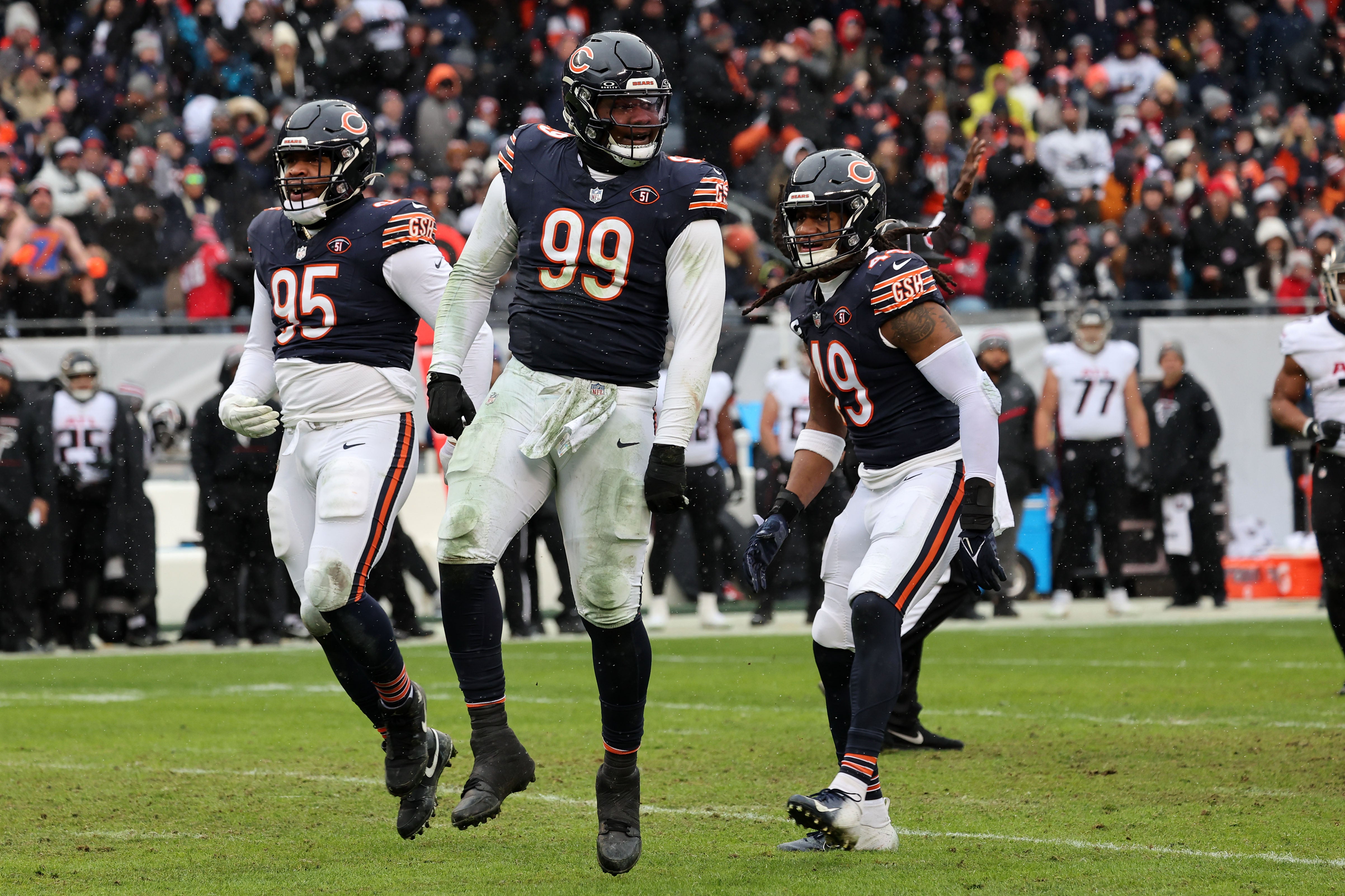 Dec 31, 2023; Chicago, Illinois, USA; Chicago Bears defensive tackle Gervon Dexter Sr. (99) reacts after a play against the Atlanta Falcons during the first half at Soldier Field.
