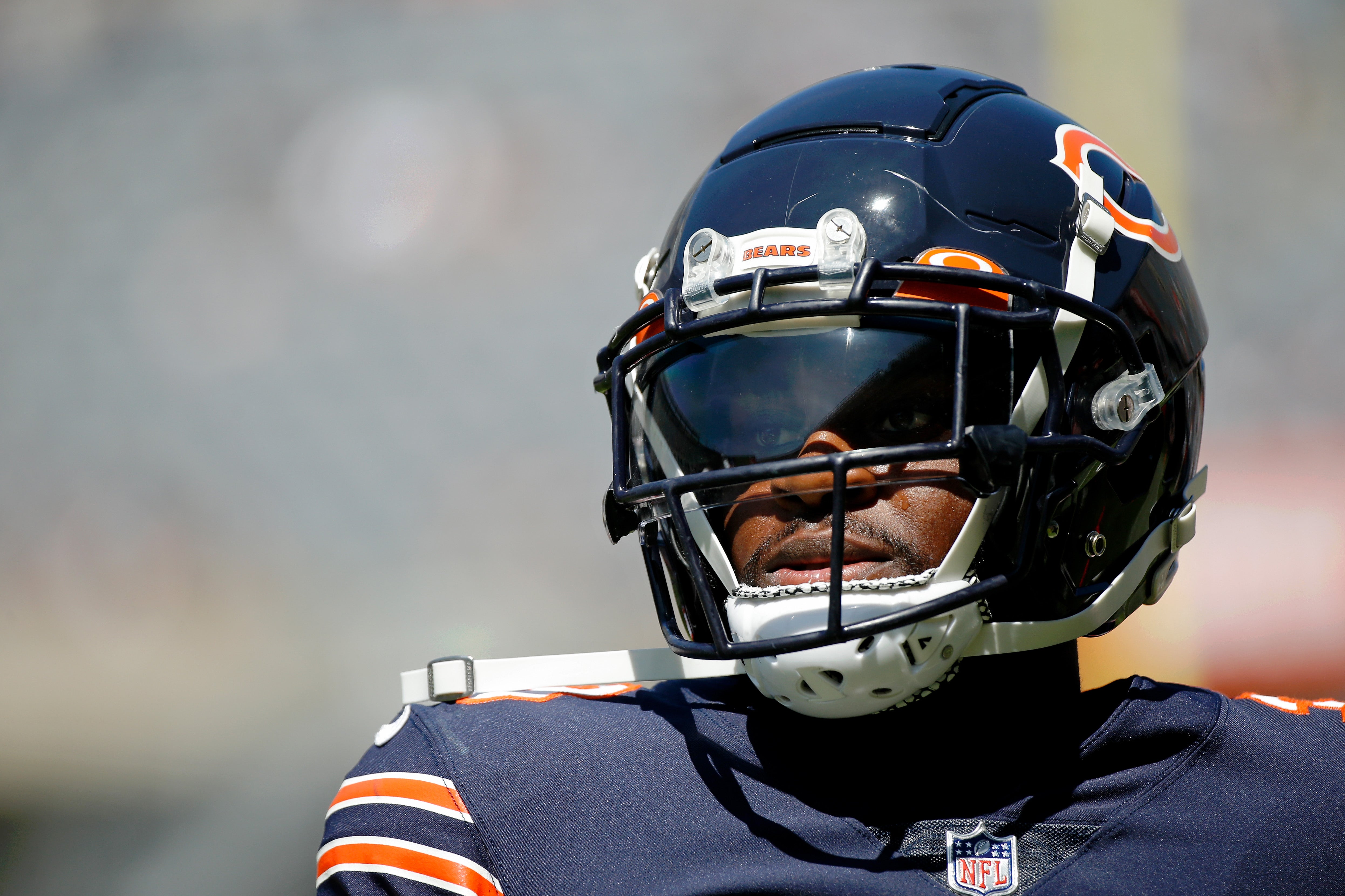 Aug 14, 2021; Chicago, Illinois, USA; Chicago Bears cornerback Jaylon Johnson (33) walks on the field during warmups before the game against the Miami Dolphins at Soldier Field.