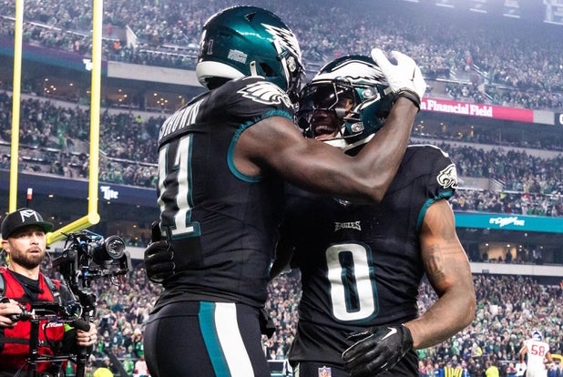 Philadelphia Eagles running back D'Andre Swift (0) and wide receiver A.J. Brown (11) celebrate a play against the New York Giants at Lincoln Financial Field.