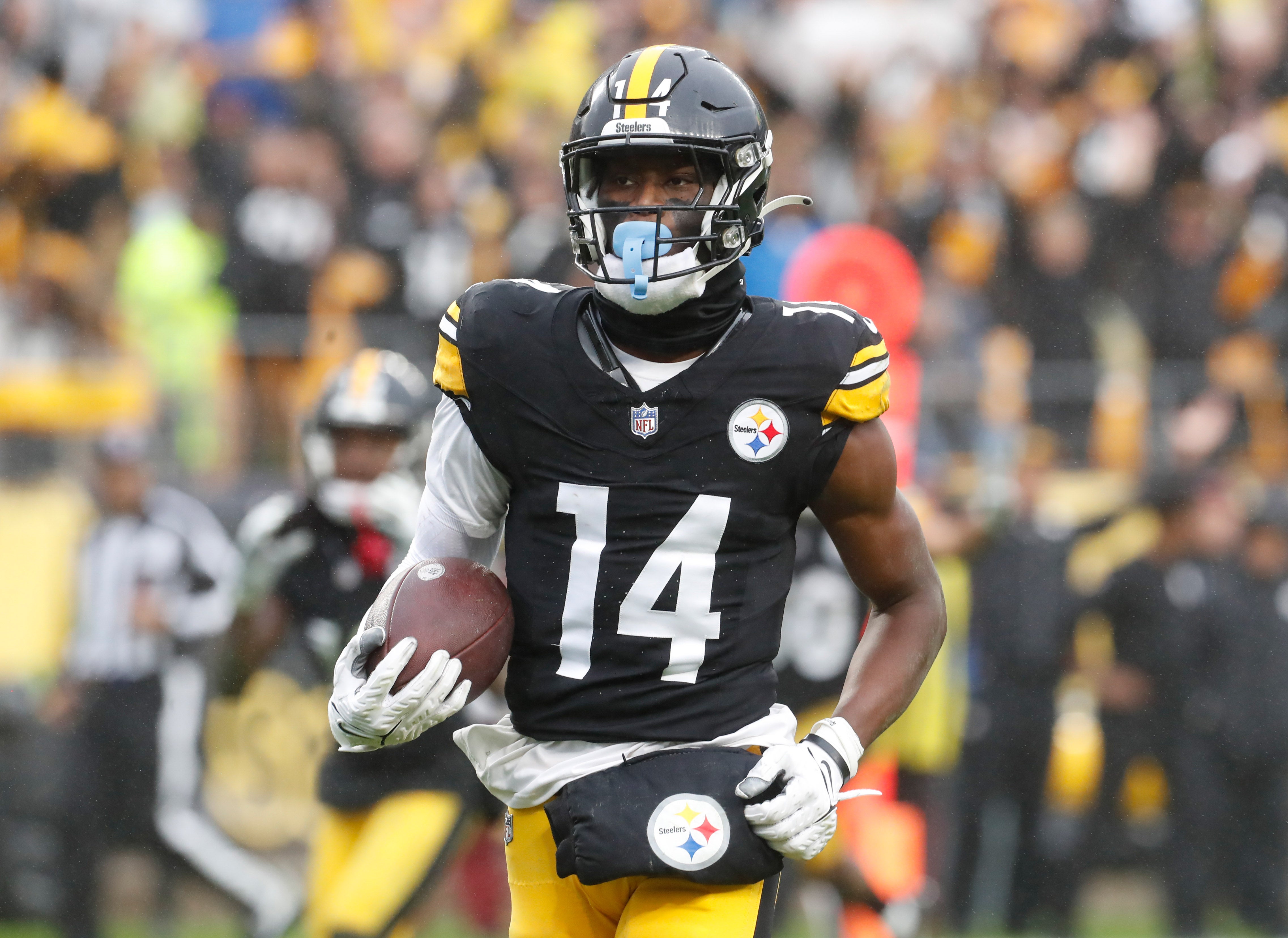 Oct 29, 2023; Pittsburgh, Pennsylvania, USA; Pittsburgh Steelers wide receiver George Pickens (14) runs to score a touchdown on a pass reception against the Jacksonville Jaguars during the third quarter at Acrisure Stadium. Jacksonville won 20-10. Mandatory Credit: Charles LeClaire-USA TODAY Sports