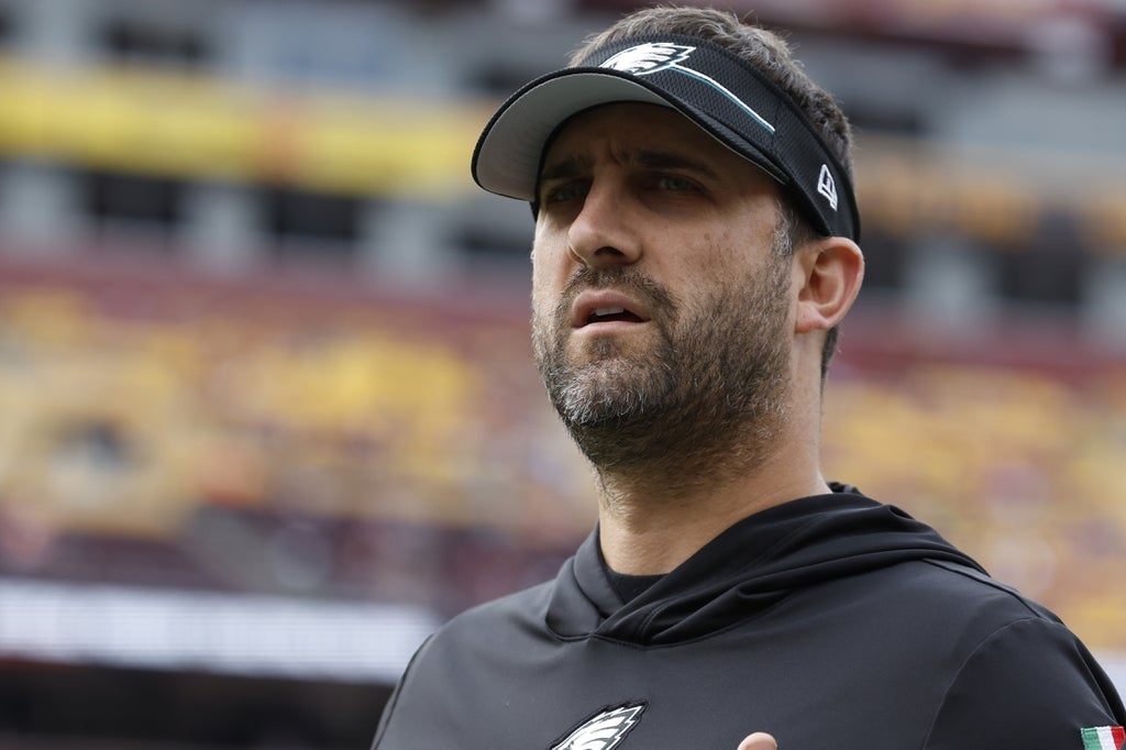 Philadelphia Eagles head coach Nick Sirianni stands on the field during warmup prior to the game Washington Commanders at FedExField.