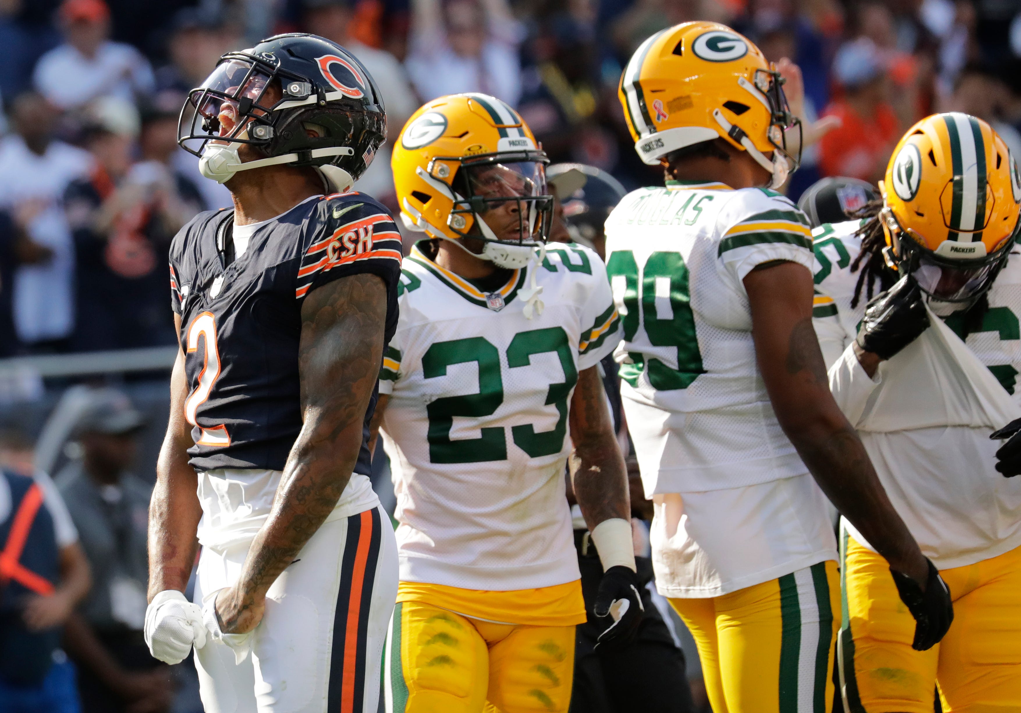 Chicago Bears wide receiver DJ Moore (2) celebrates a first down run against the Green Bay Packers during their football game Sunday, September 10, 2023, at Soldier Field in Chicago, Ill.