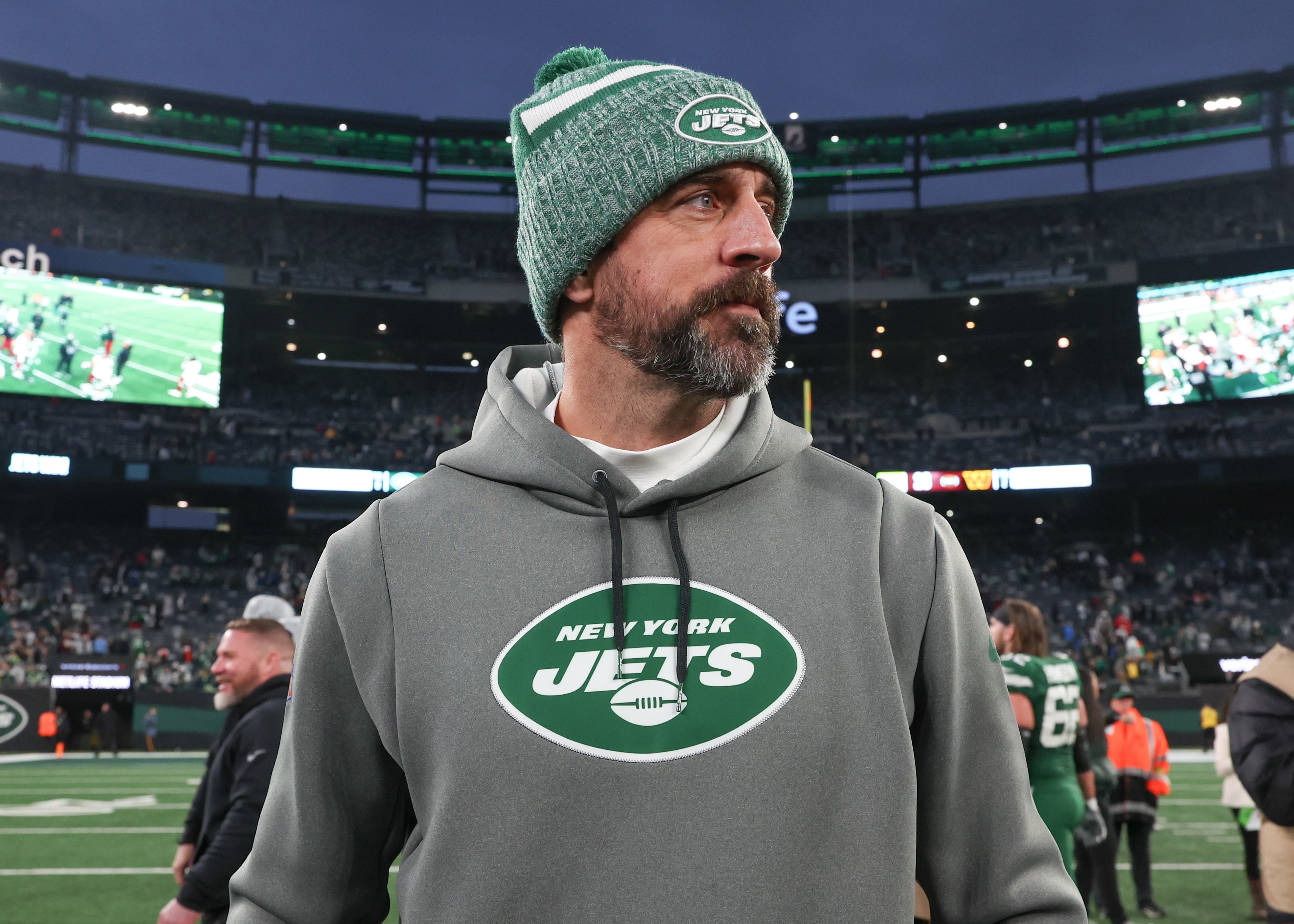 New York Jets quarterback Aaron Rodgers (8) on the field after the game against the Washington Commanders at MetLife Stadium.