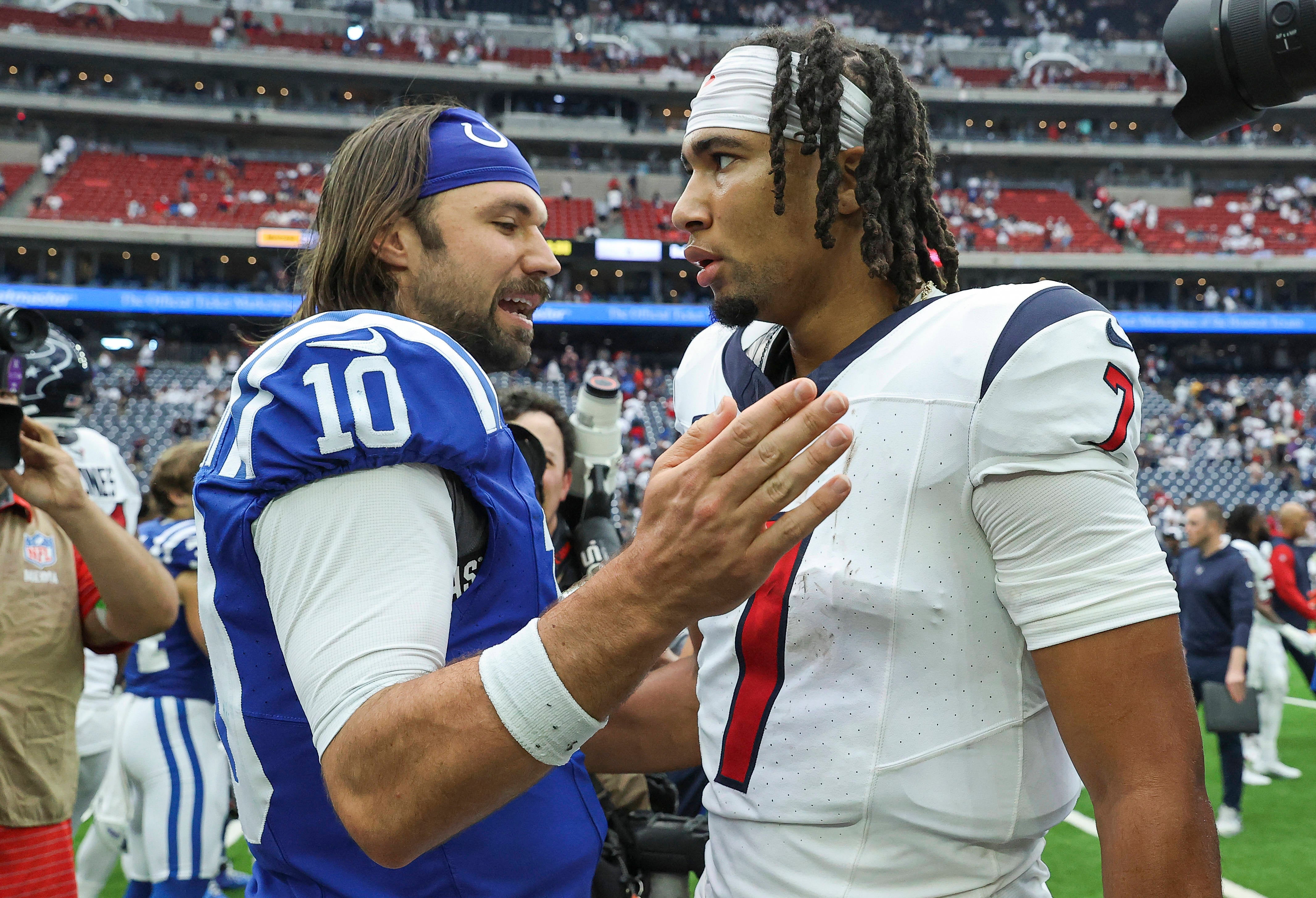 Sep 17, 2023; Houston, Texas, USA; Indianapolis Colts quarterback Gardner Minshew (10) talks with Houston Texans quarterback C.J. Stroud (7) after the game at NRG Stadium.