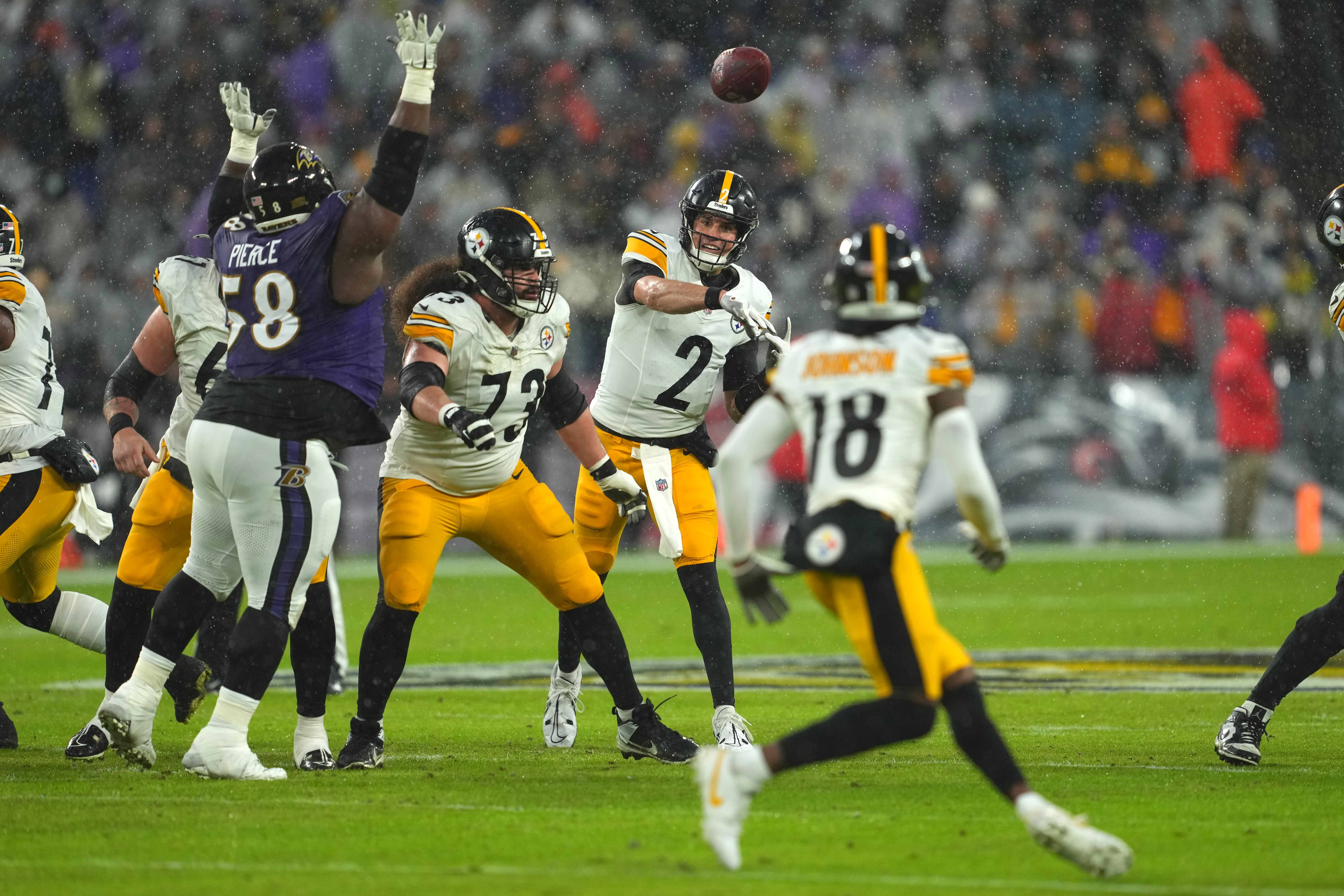 Jan 6, 2024; Baltimore, Maryland, USA; Pittsburgh Steelers quarterback Mason Rudolph (2) completes a first quarter pass to wide receiver Deontae Johnson (18) against the Baltimore Ravens at M&T Bank Stadium. Mandatory Credit: Mitch Stringer-USA TODAY Sports