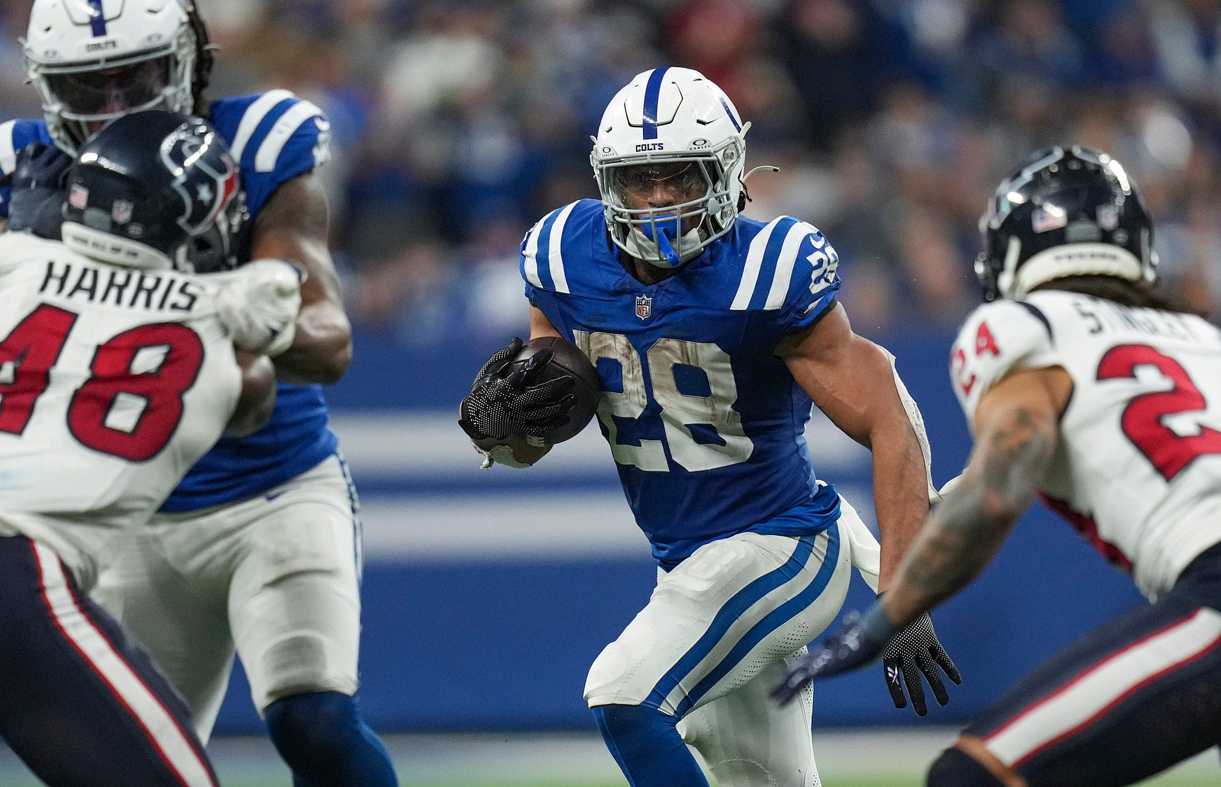 Indianapolis Colts running back Jonathan Taylor (28) runs the ball on Saturday, Jan. 6, 2024, during a game against the Houston Texans at Lucas Oil Stadium in Indianapolis.
