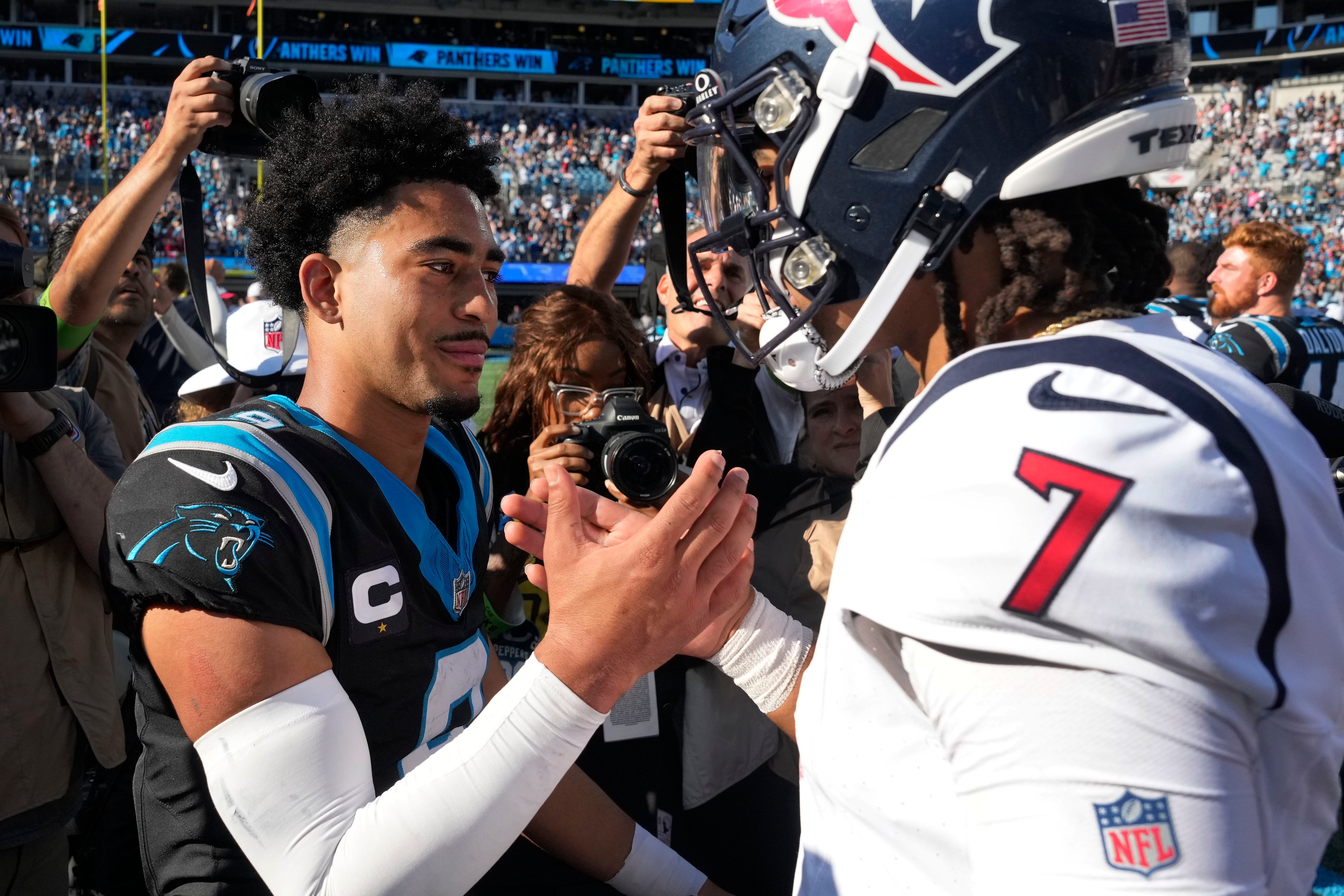 Oct 29, 2023; Charlotte, North Carolina, USA; Carolina Panthers quarterback Bryce Young (9) and Houston Texans quarterback C.J. Stroud (7) after the game at Bank of America Stadium. Mandatory Credit: Bob Donnan-USA TODAY Sports