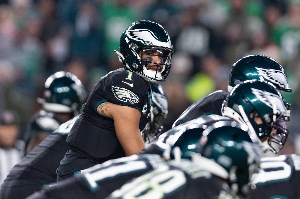 Philadelphia Eagles quarterback Jalen Hurts (1) prepares to snap the ball against the New York Giants during the second quarter at Lincoln Financial Field.