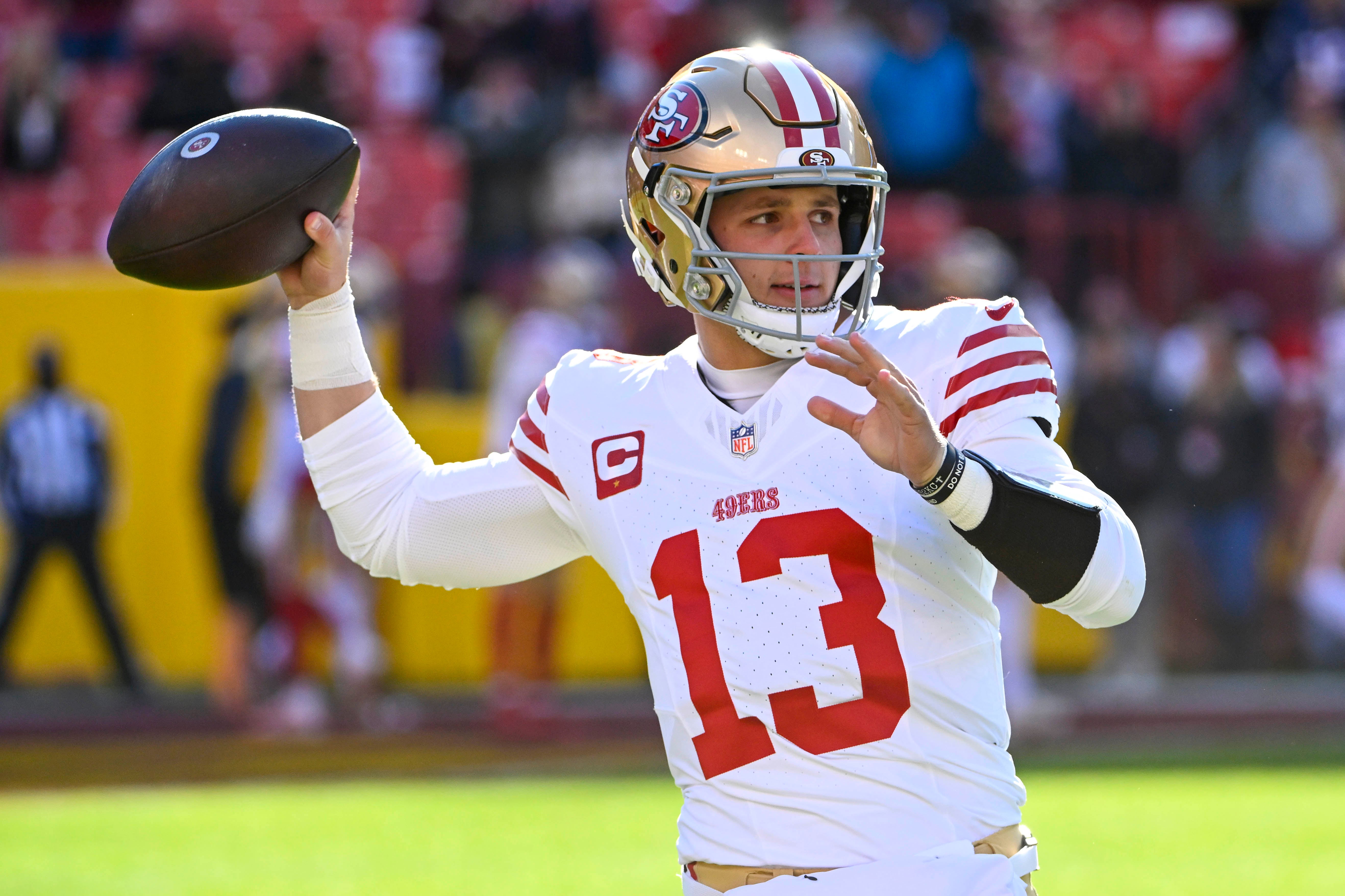 Dec 31, 2023; Landover, Maryland, USA; San Francisco 49ers quarterback Brock Purdy (13) warms up before the game against the Washington Commanders at FedExField.